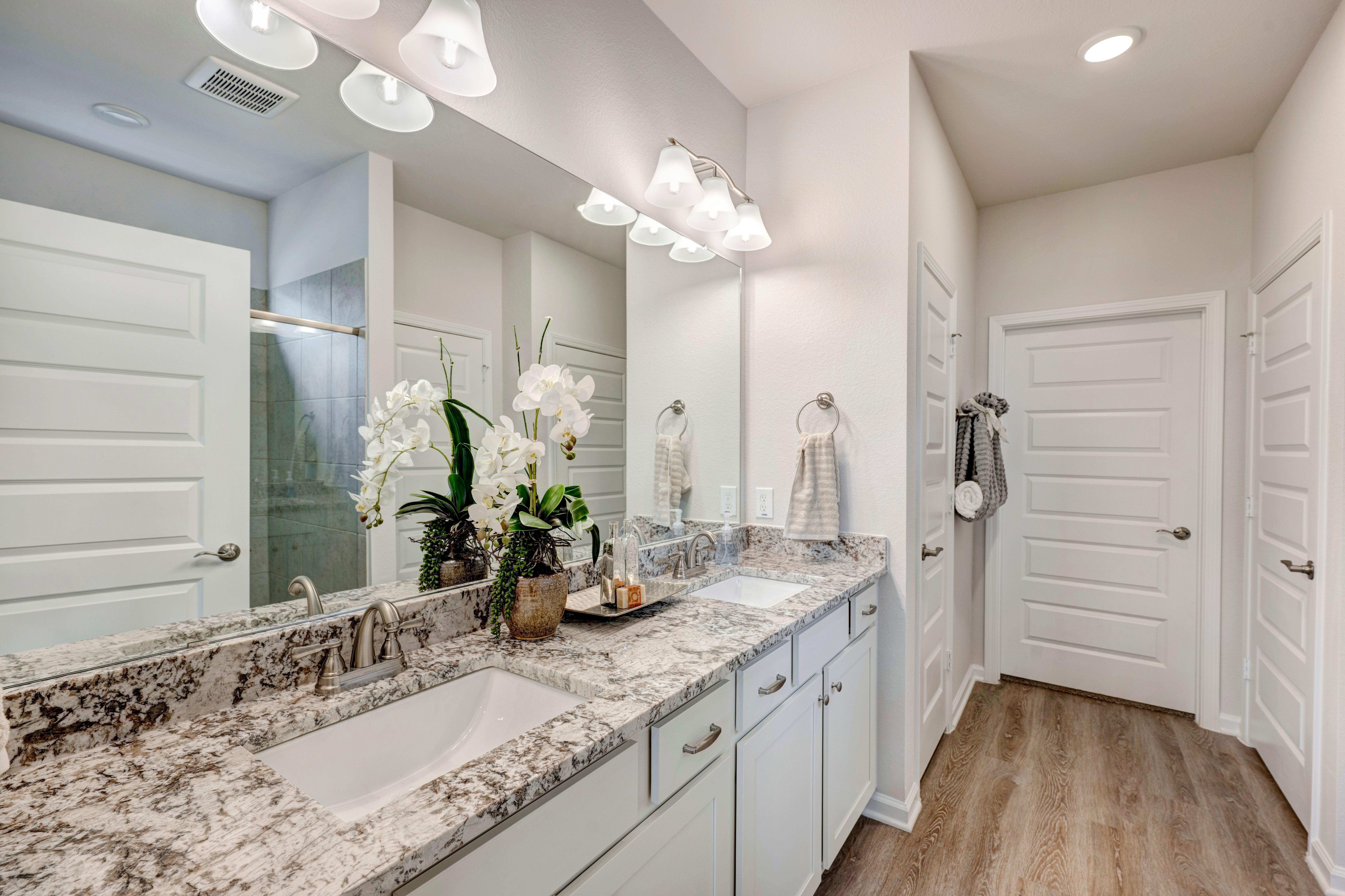 The Robin II- Primary Bathroom with Dual Vanities and Large Walk-In Shower