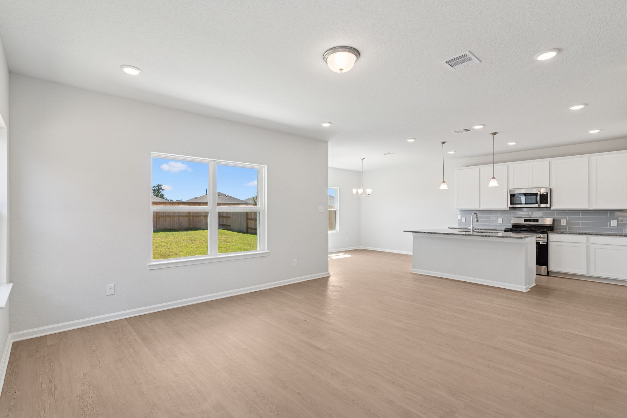 The Oriole II- Family Room into Kitchen
