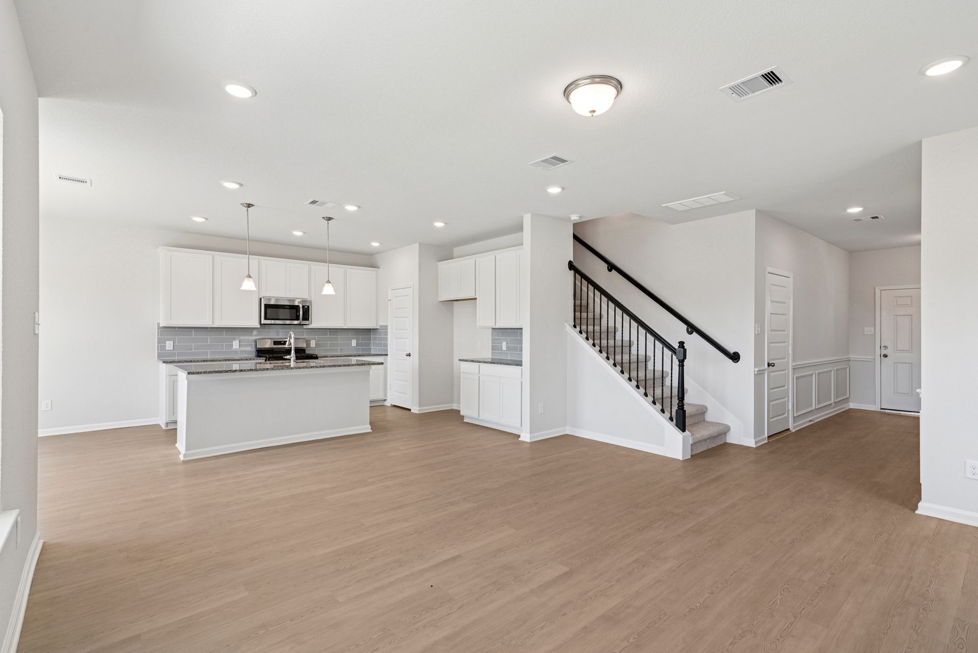 The Oriole II- Family Room into Kitchen