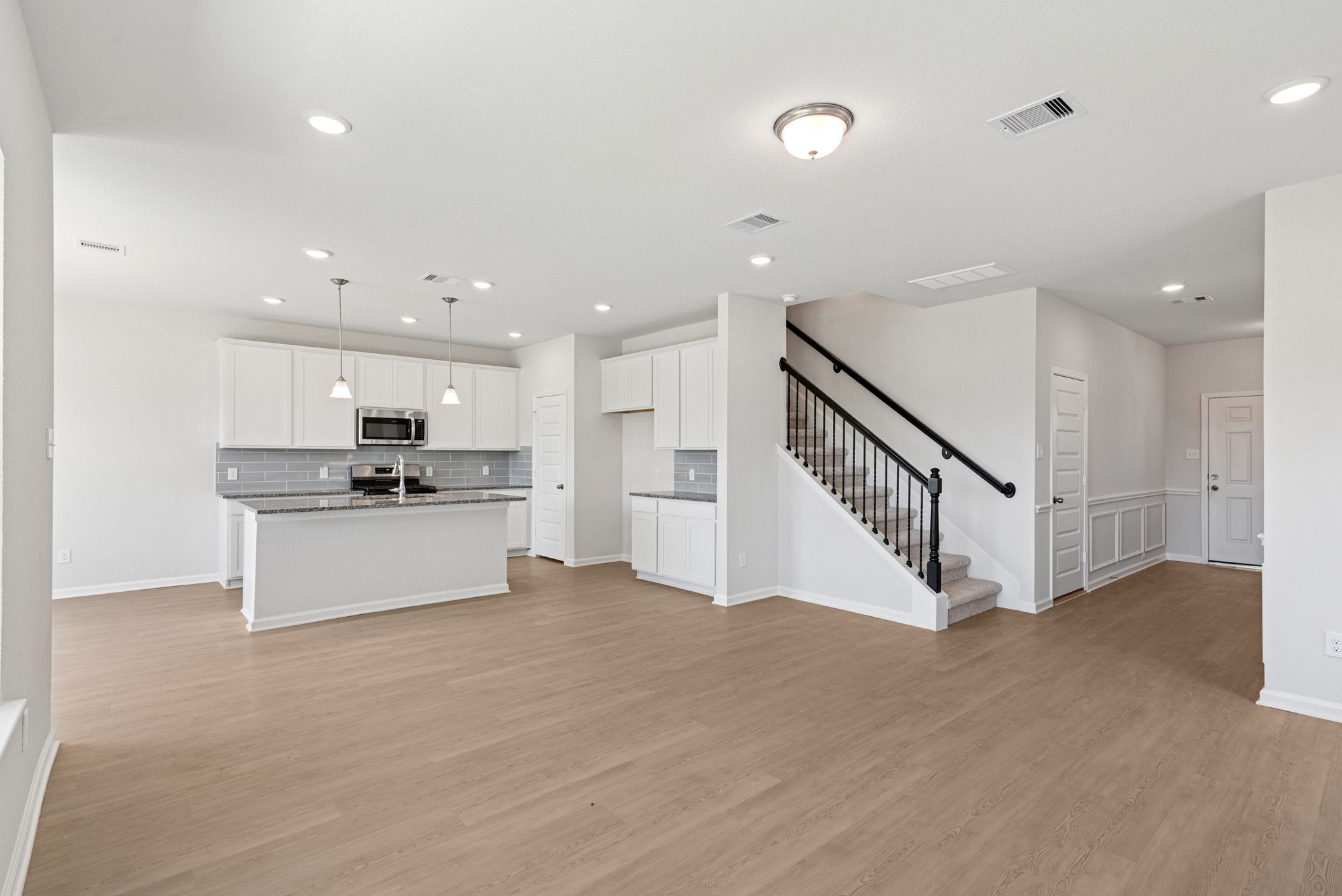 The Oriole II- Family Room into Kitchen