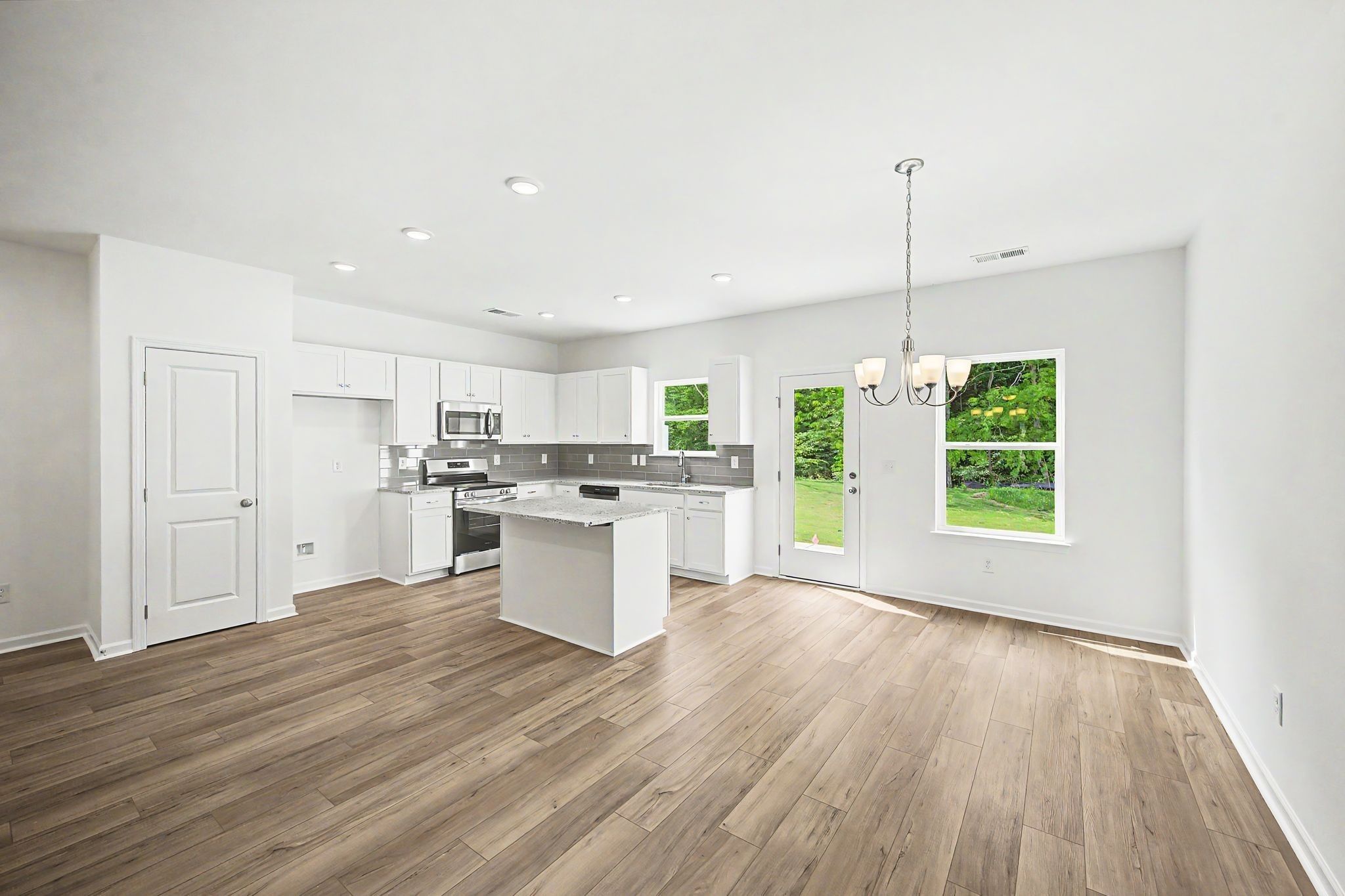 Kitchen with an island and separate dining space.