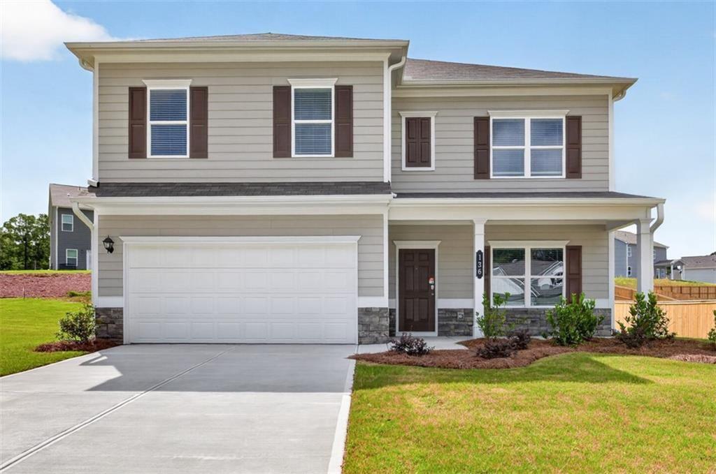 Two-story exterior with light gray siding and dark brown shutters