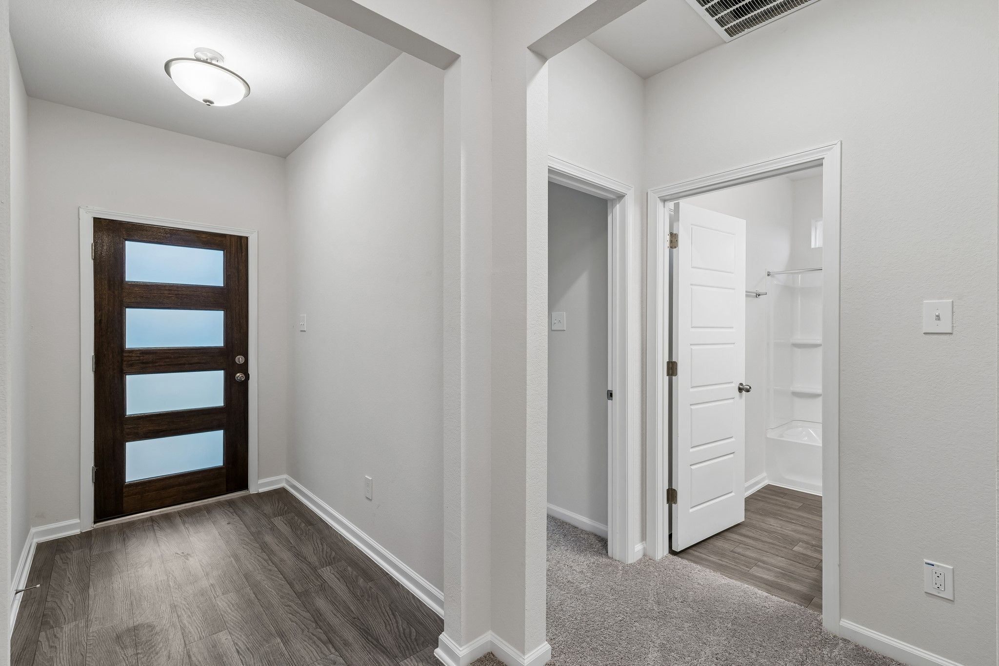 The Crawford- Foyer into Hall Bath and Secondary Bedrooms