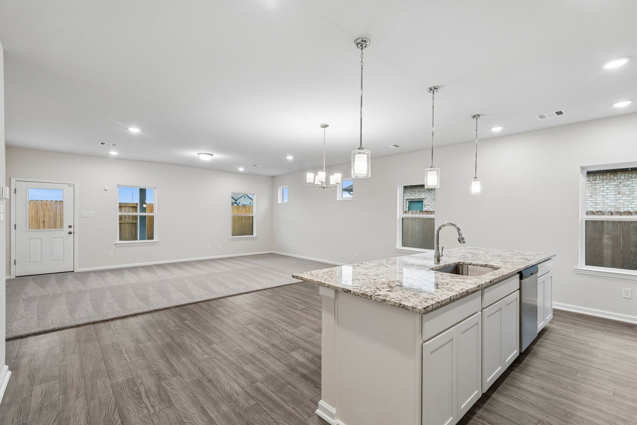 The Crawford- Kitchen into Family Room