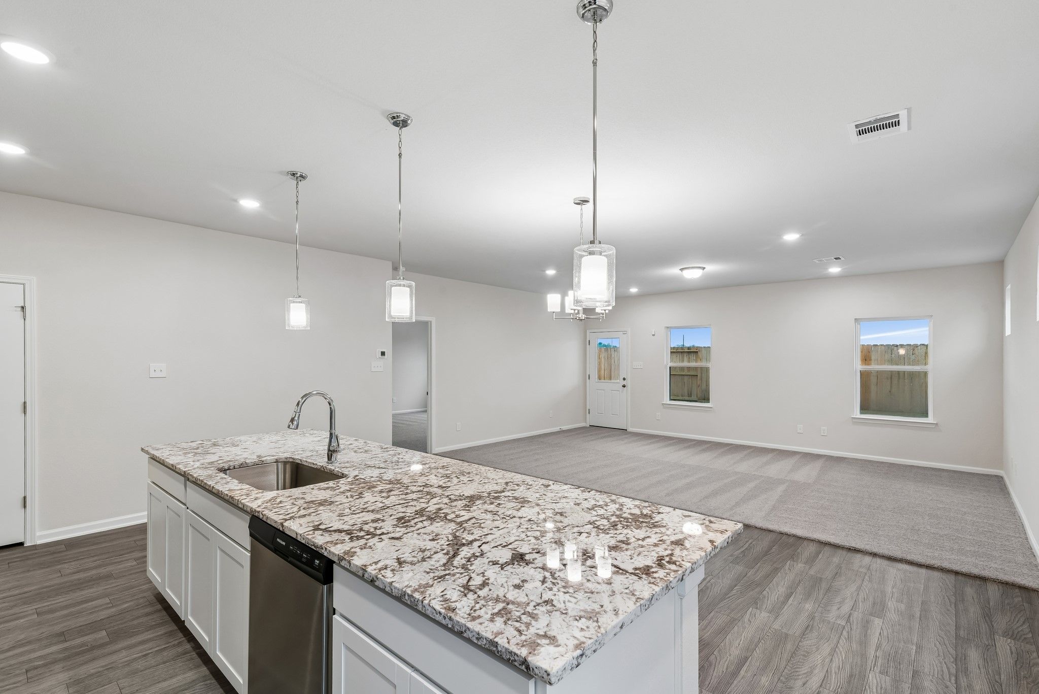 The Crawford- Kitchen into Family Room