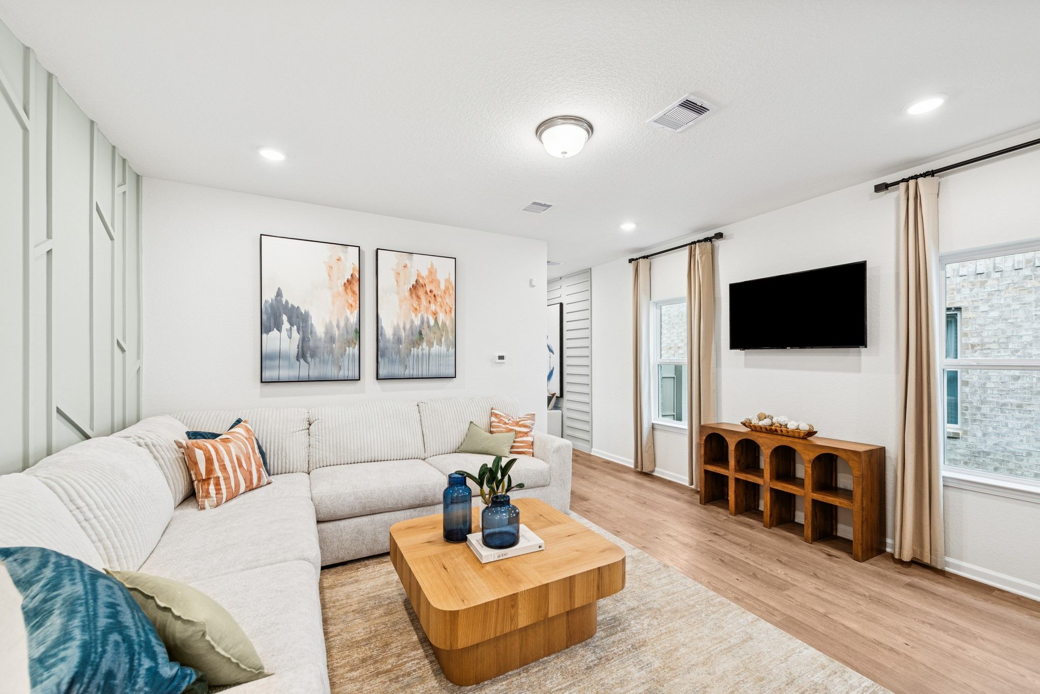 Family Room. Sample image for illustration; upgrades, options, and colors may vary.