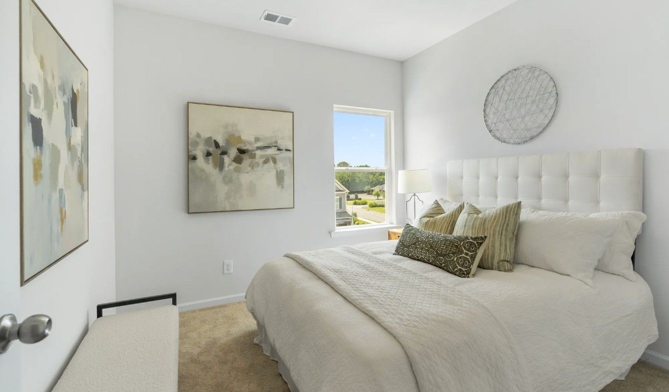 Bedroom 2. *Photos of model home*