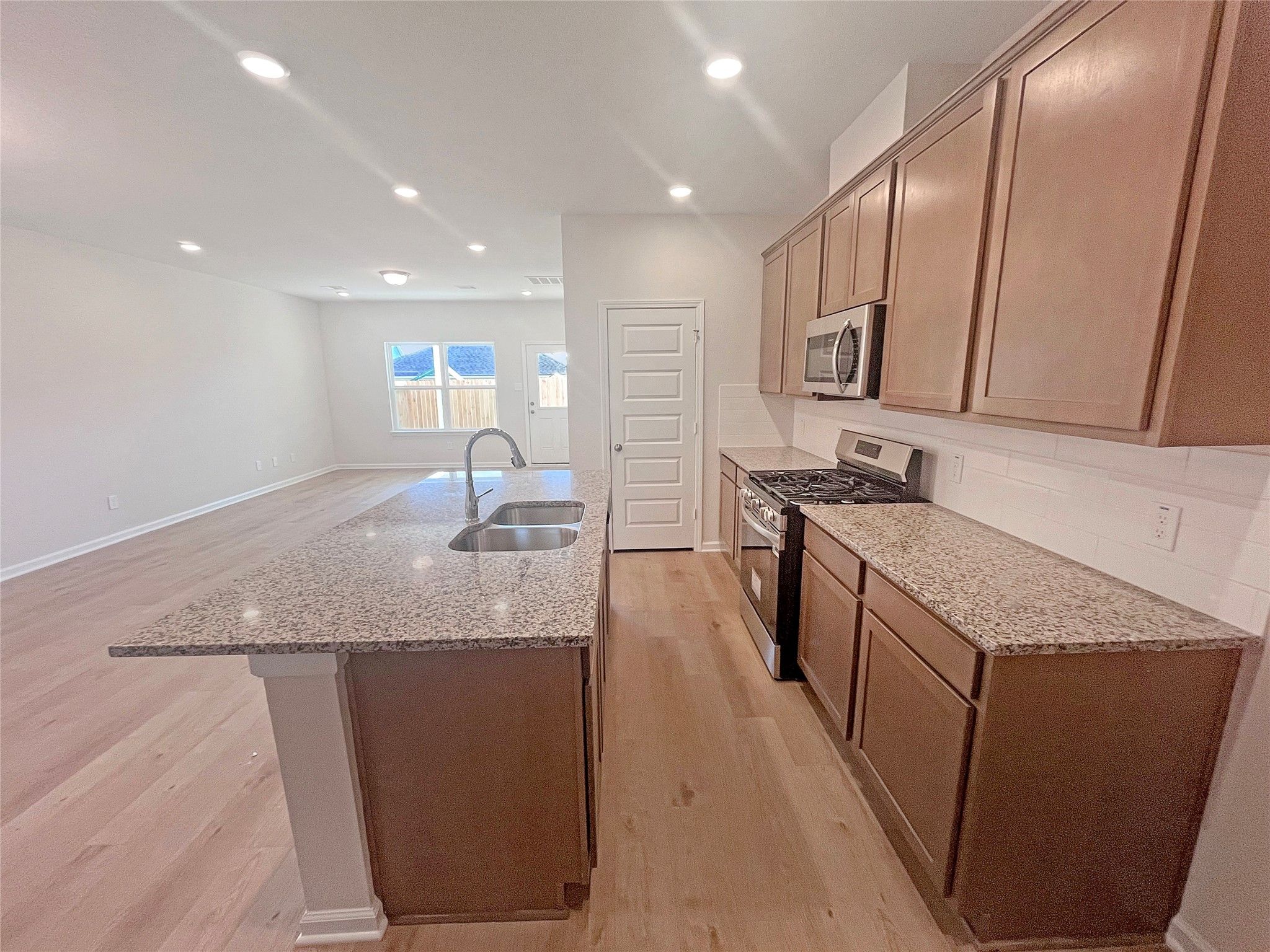 The Robin II- Kitchen. Sample image to be used for example only, colors, options and upgrades vary.