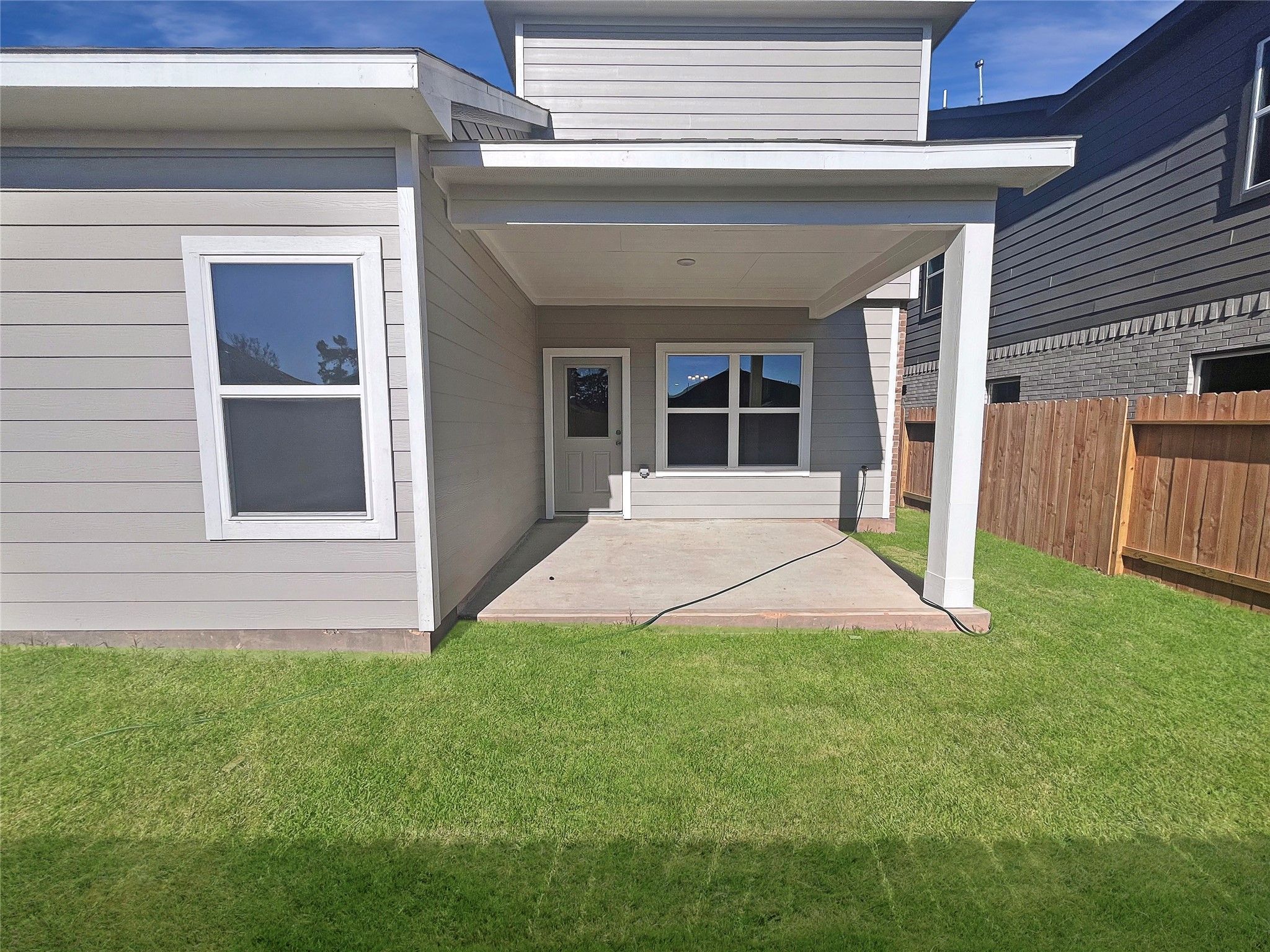 The Robin II- Rear Covered Patio. Sample image to be used for example only, colors, options and upg