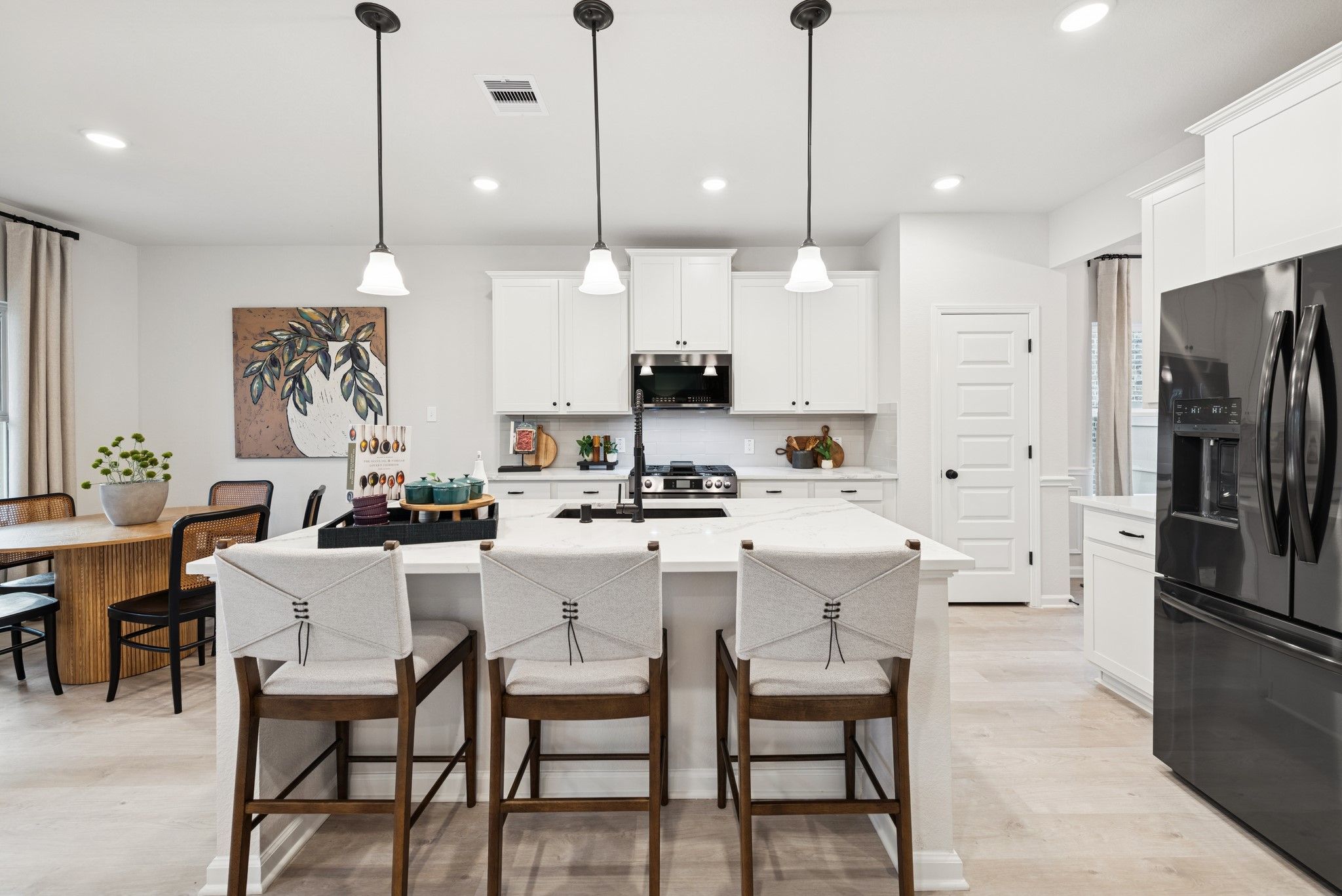 The Princeton II- Kitchen  and Breakfast Area. Staged model home shown for illustration only; actua