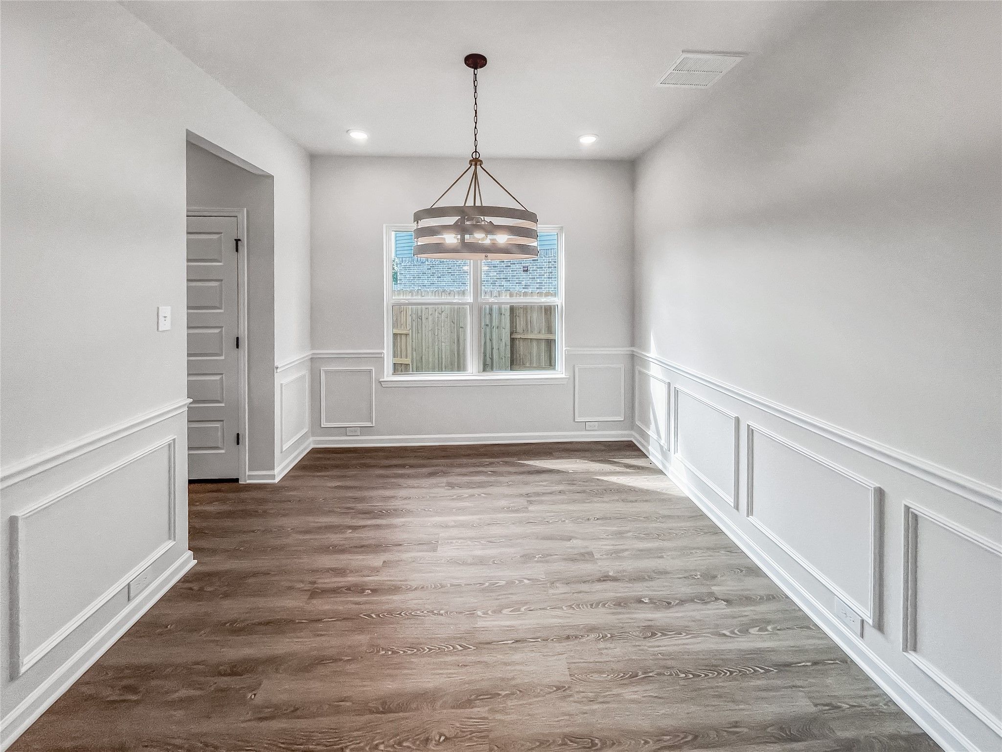 The Princeton II- Formal Dining Room with chair rail molding detail.