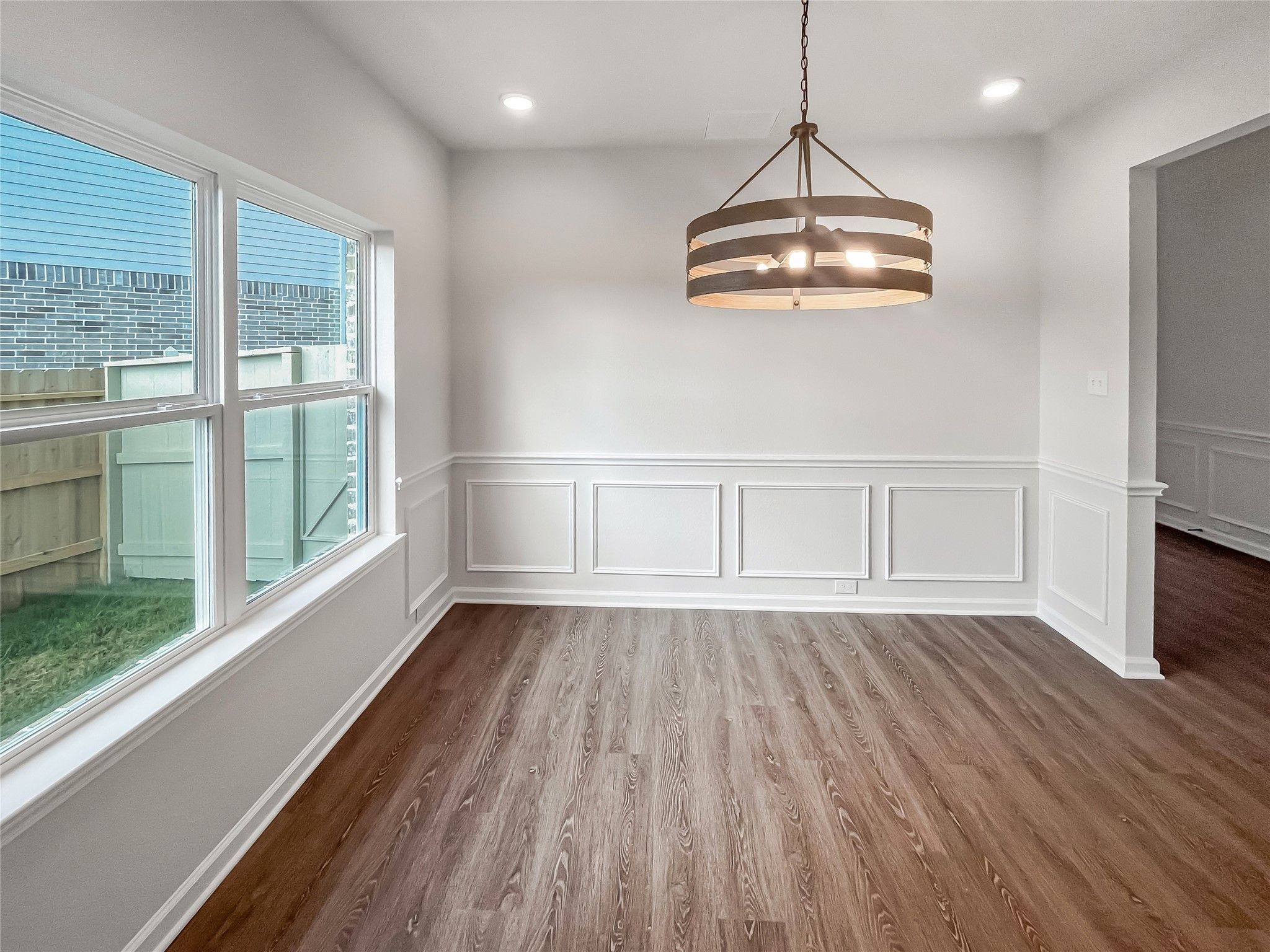 The Princeton II- Formal Dining Room with chair rail molding detail.