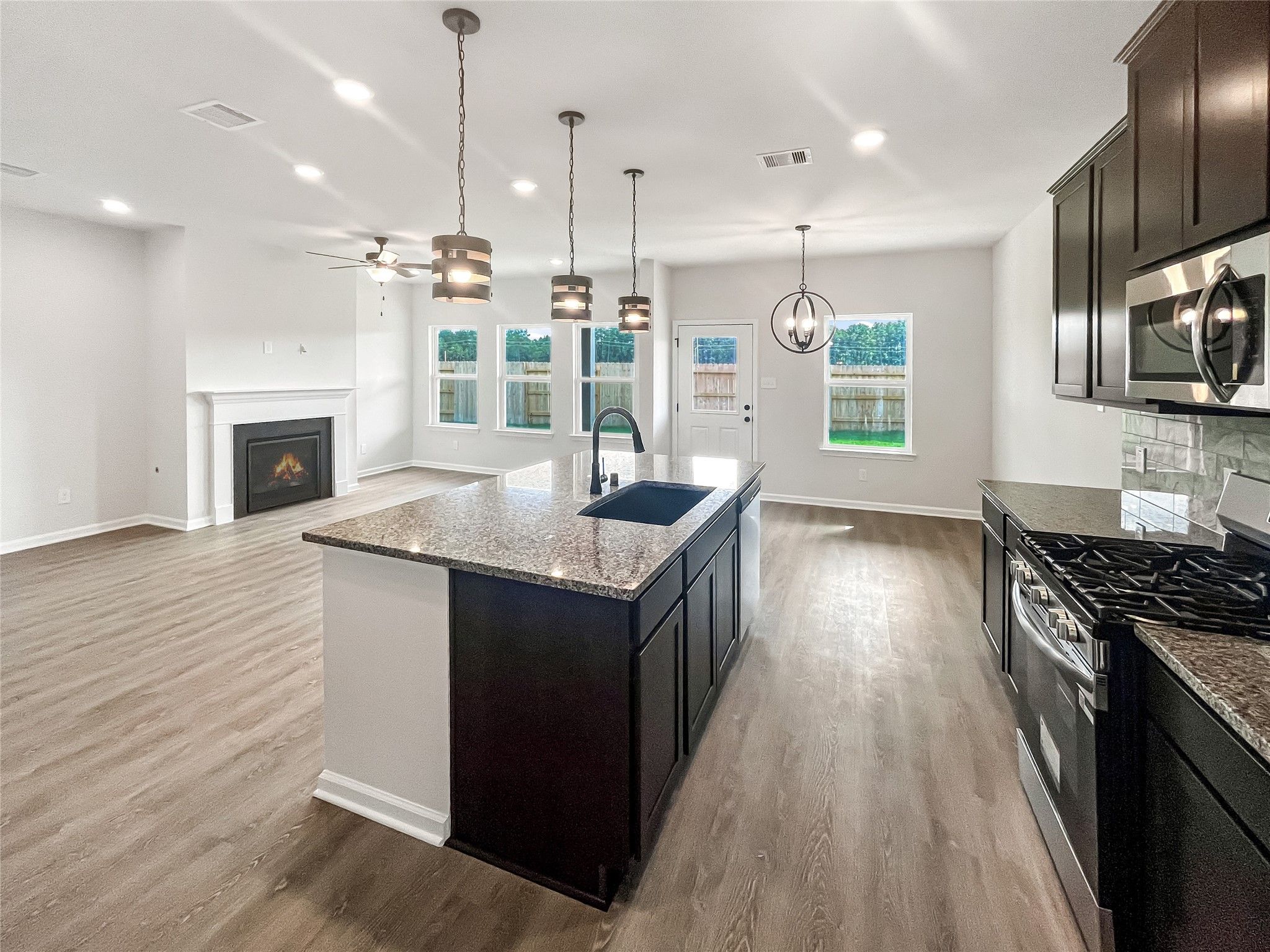 The Princeton II- Kitchen into Family Room.