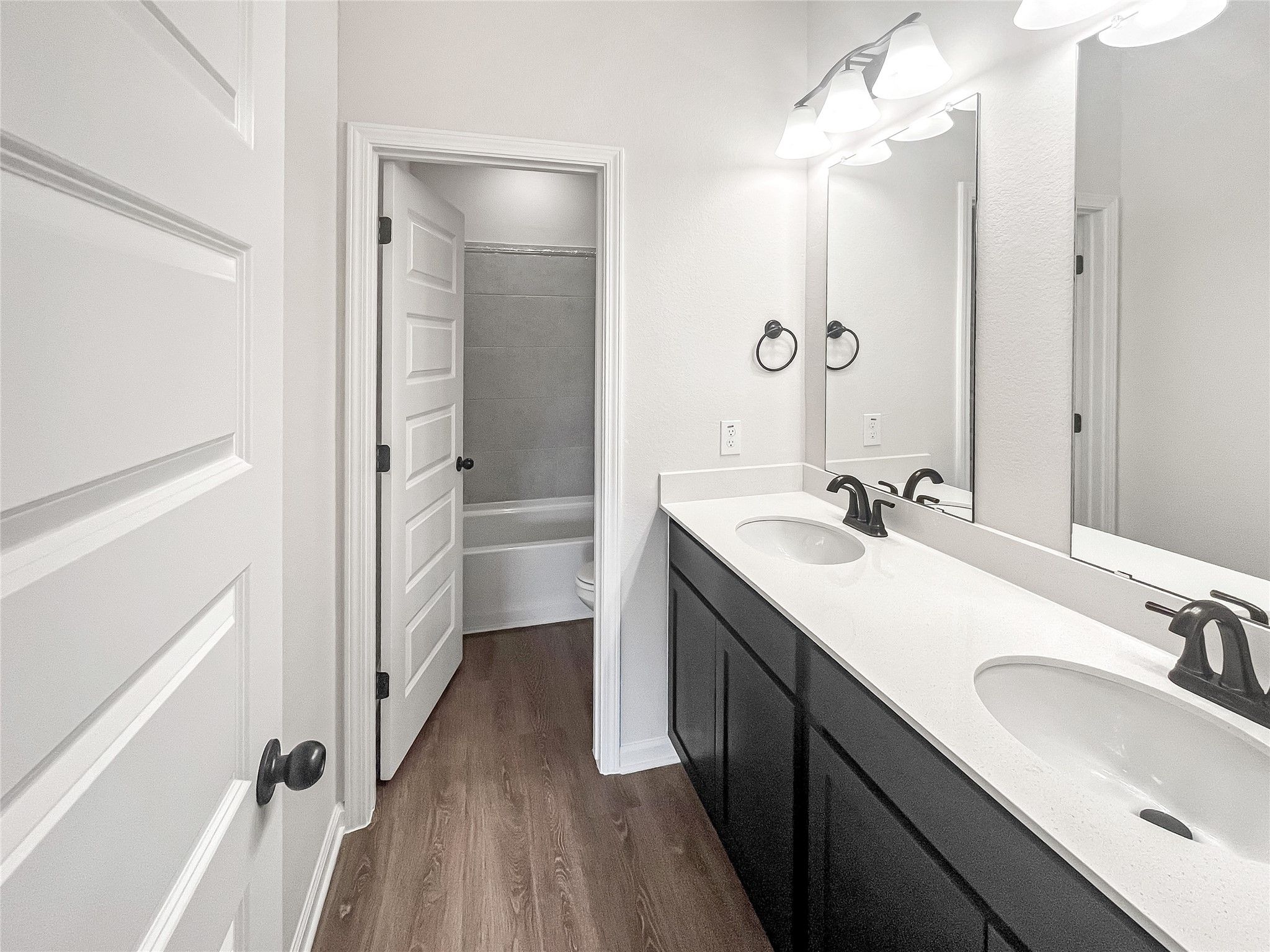 The Princeton II- Hall Bath with Dual Vanities.