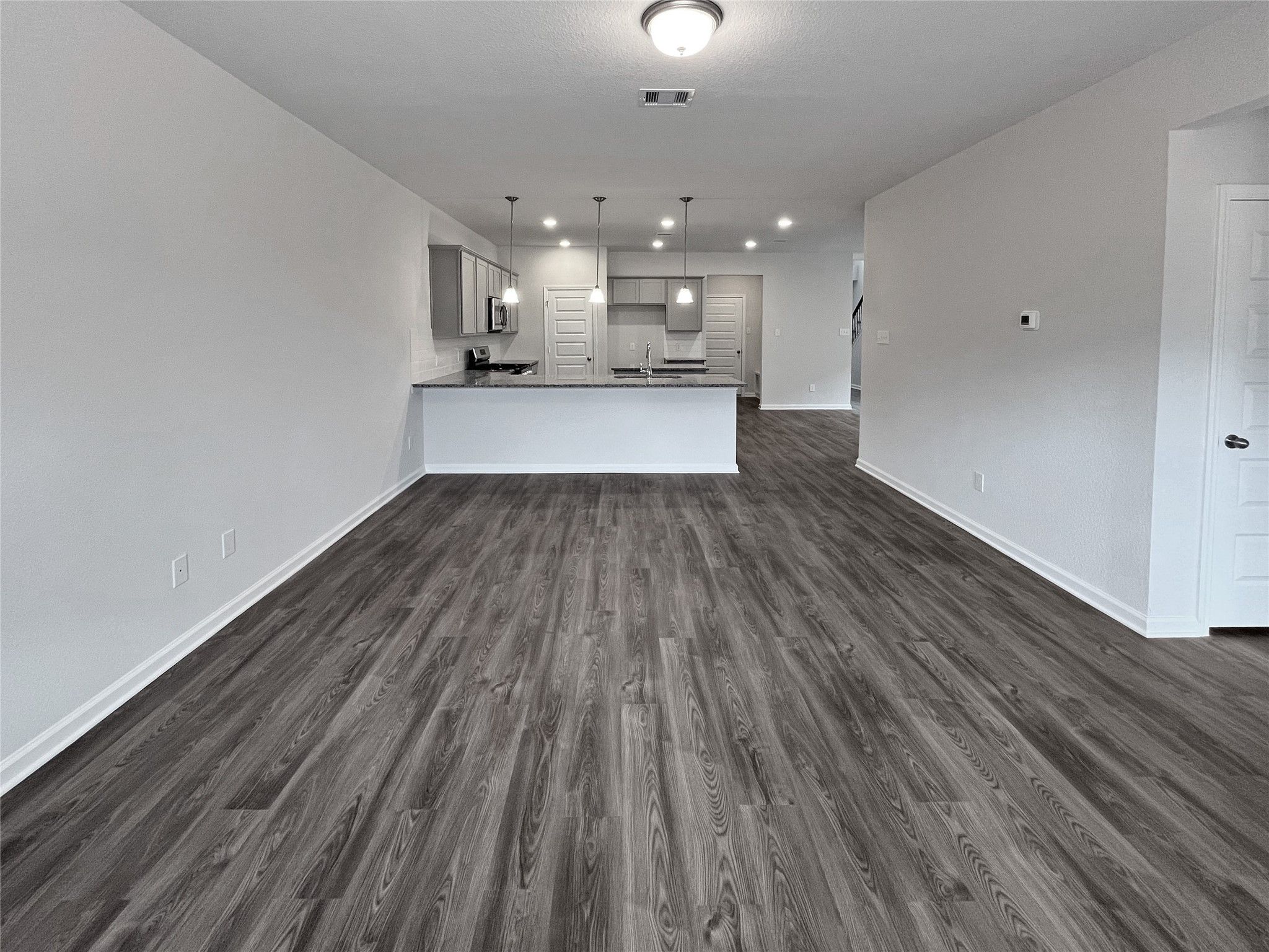 The Sparrow II- Family Room. Sample image for illustration; upgrades, options, and colors may vary.