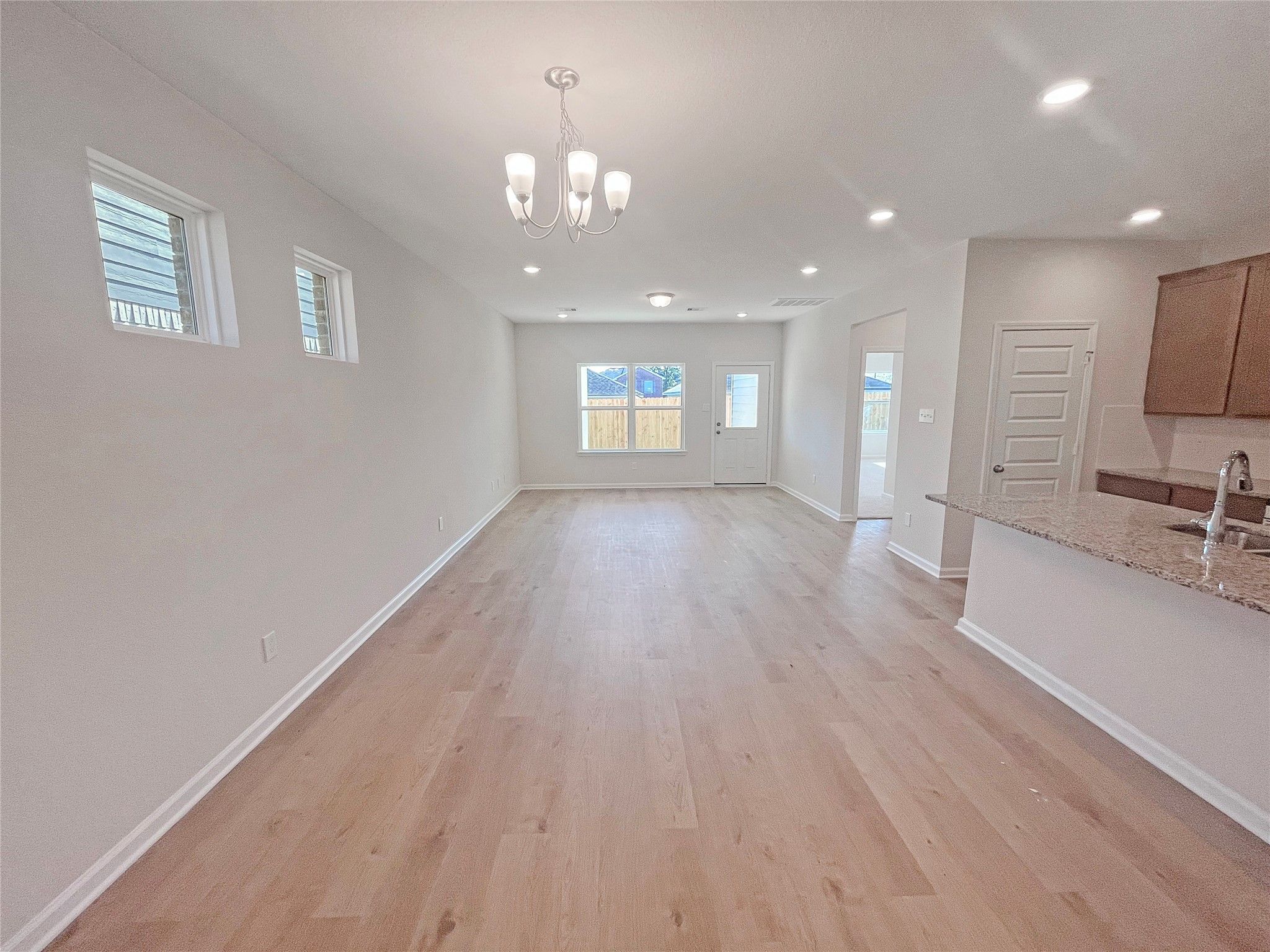The Robin II- Dining Area into Family Room. Sample image to be used for example only, colors, optio