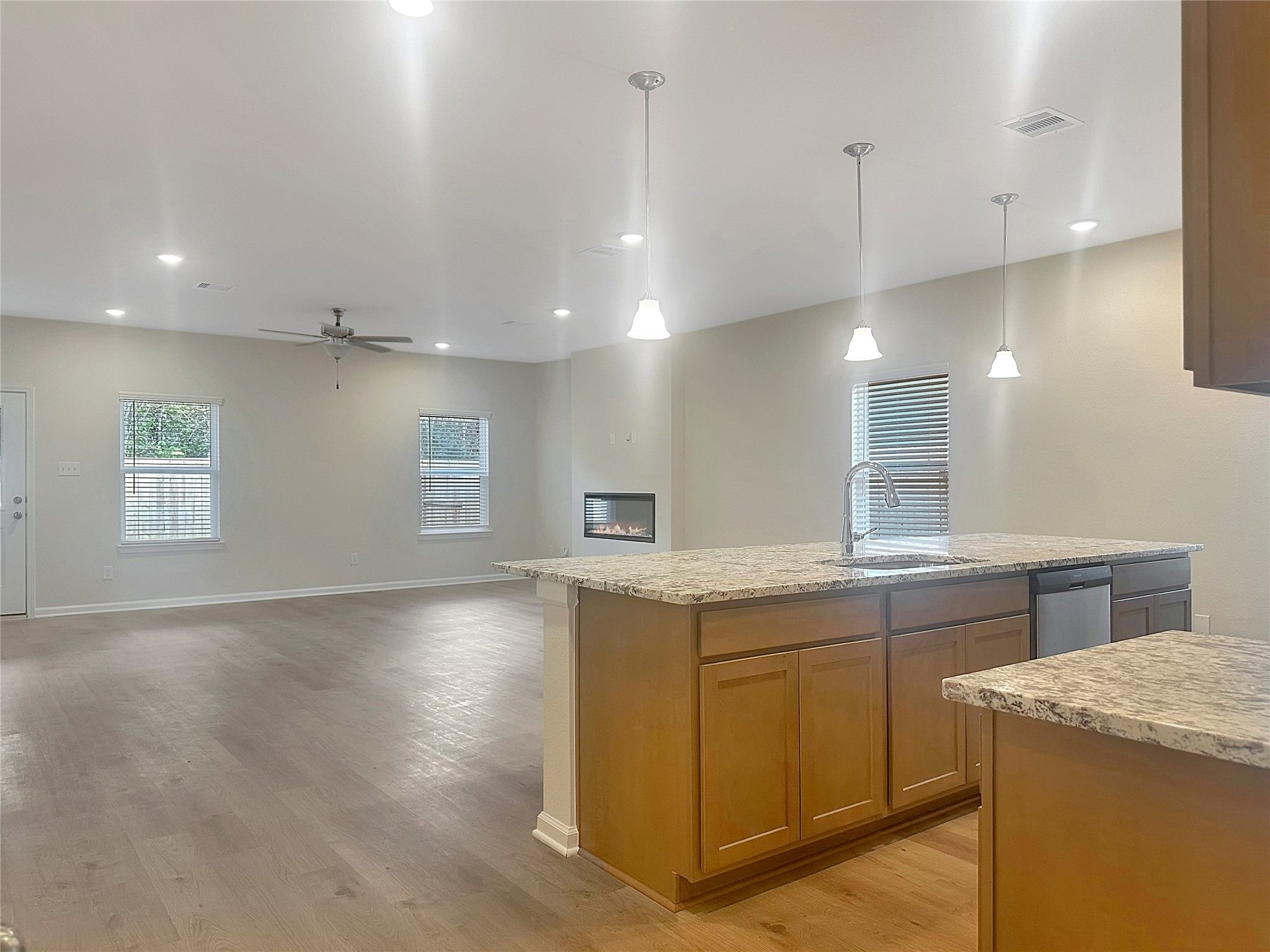 The Crawford- Kitchen and Family Room. Home is under construction, photos used for illustration onl
