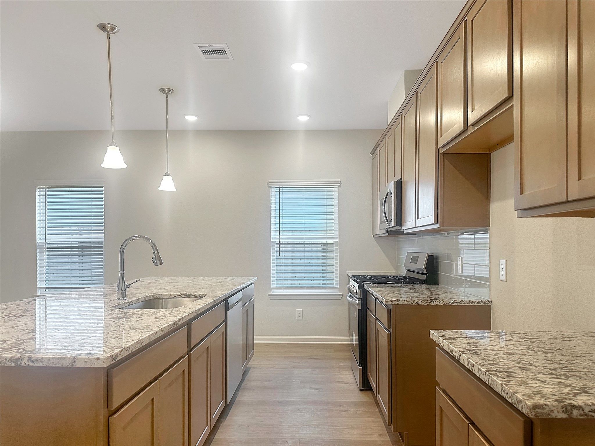 The Crawford- Kitchen. Home is under construction, photos used for illustration only; actual featur