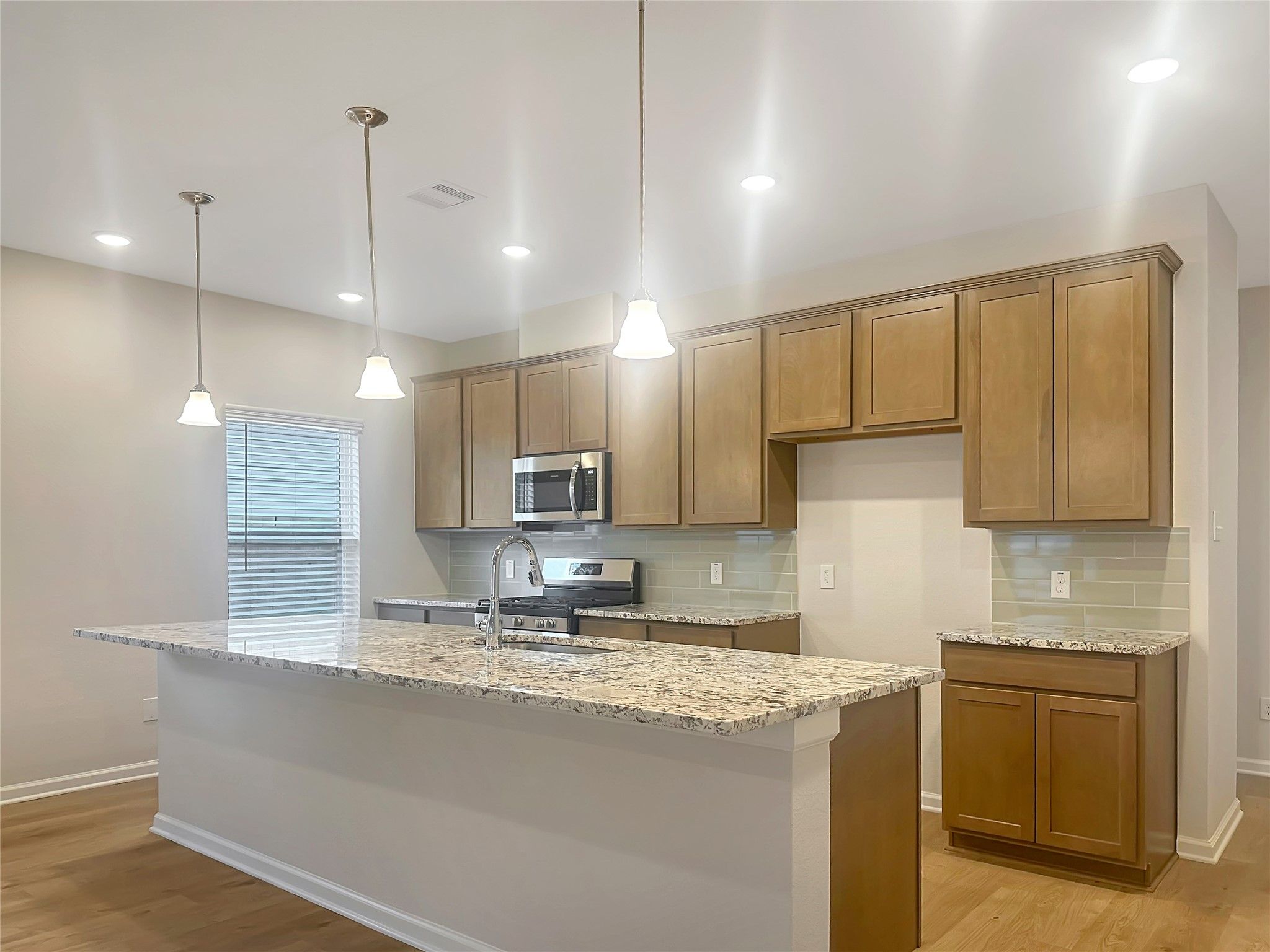 The Crawford- Kitchen. Home is under construction, photos used for illustration only; actual featur