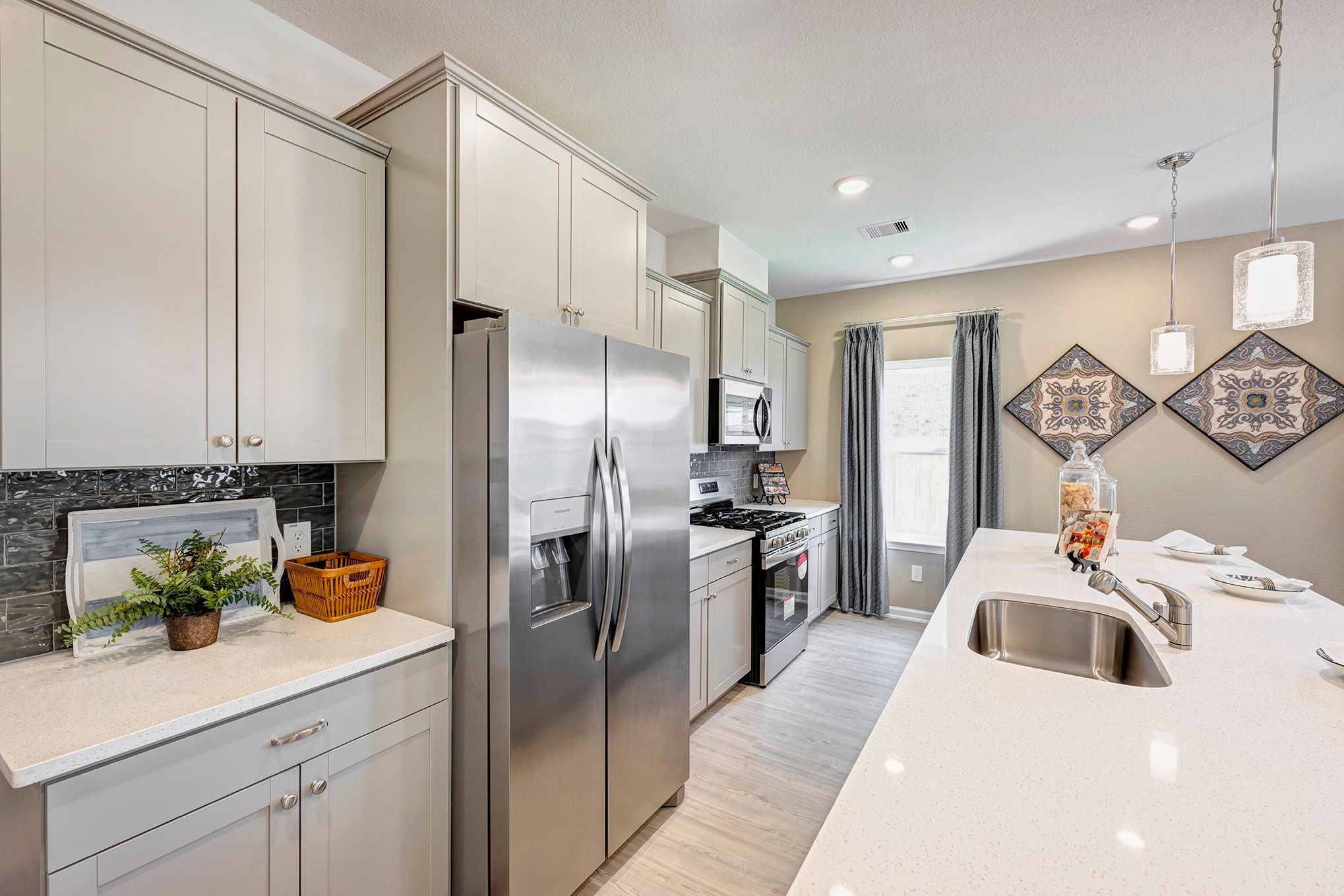 Staged model home shown for illustration only; actual features, colors, and upgrades may vary.