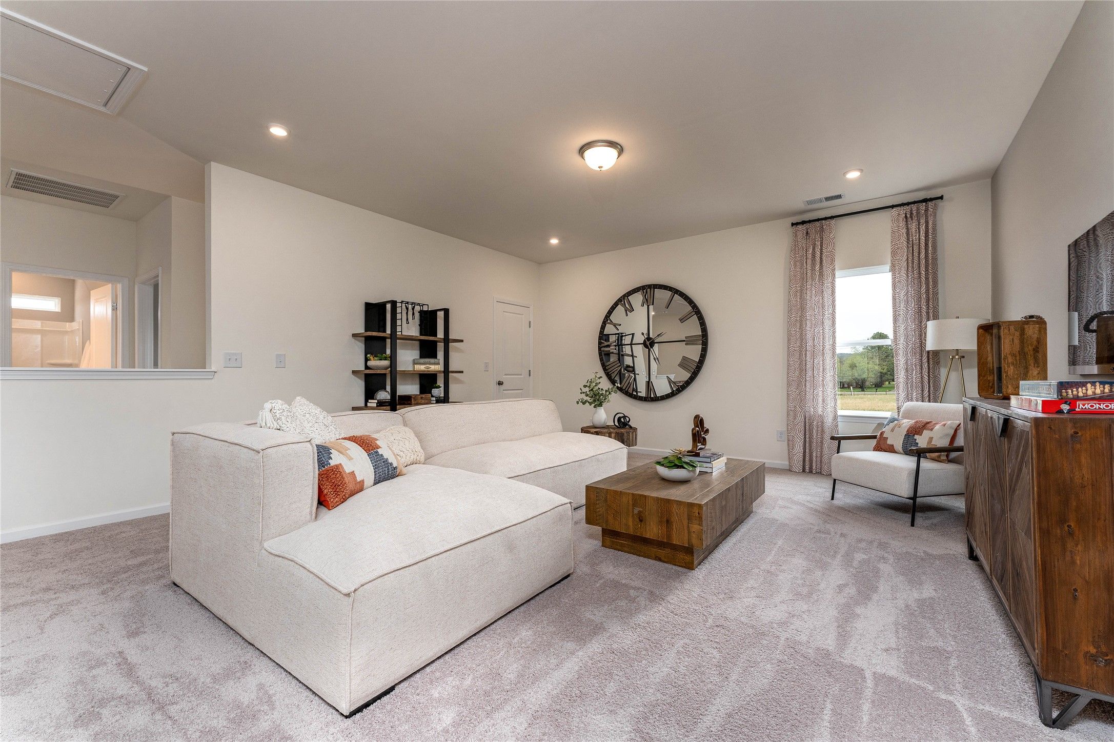 The Palmer- Loft/Game Room. The sample image is a staged model, to be used for illustrative purpose
