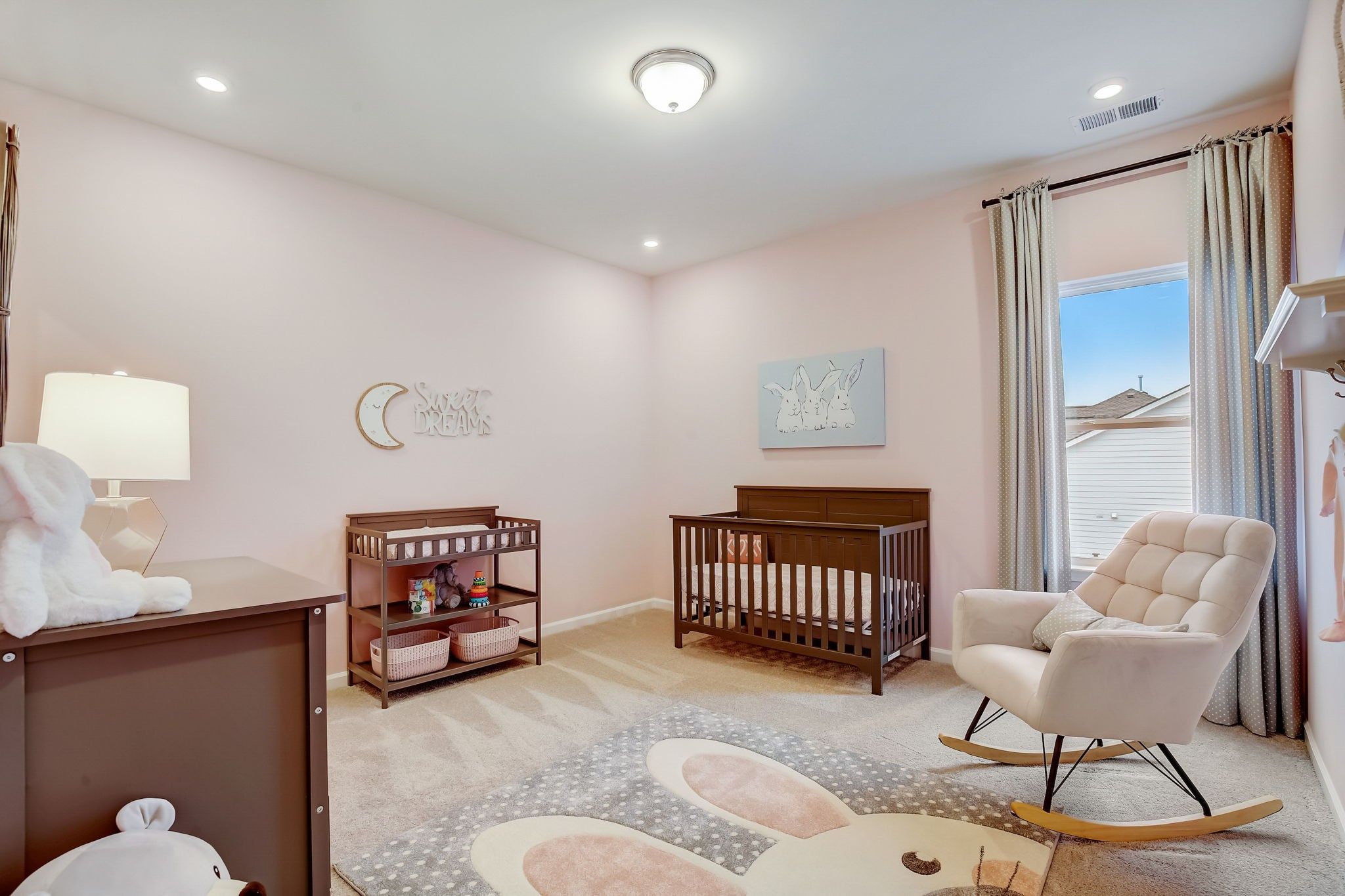 The Palmer- Second Floor Primary Suite. The sample image is a staged model, to be used for illustra