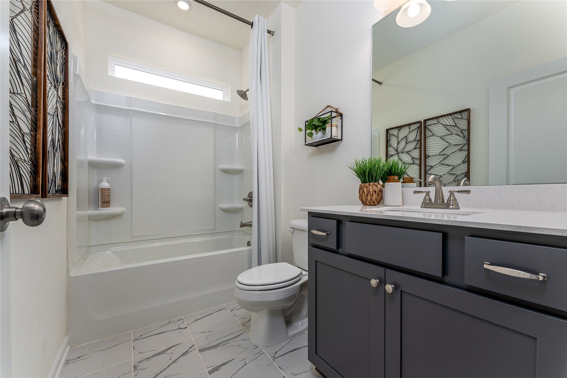 The Palmer- Bath 2 Upstairs. The sample image is a staged model, to be used for illustrative purpos