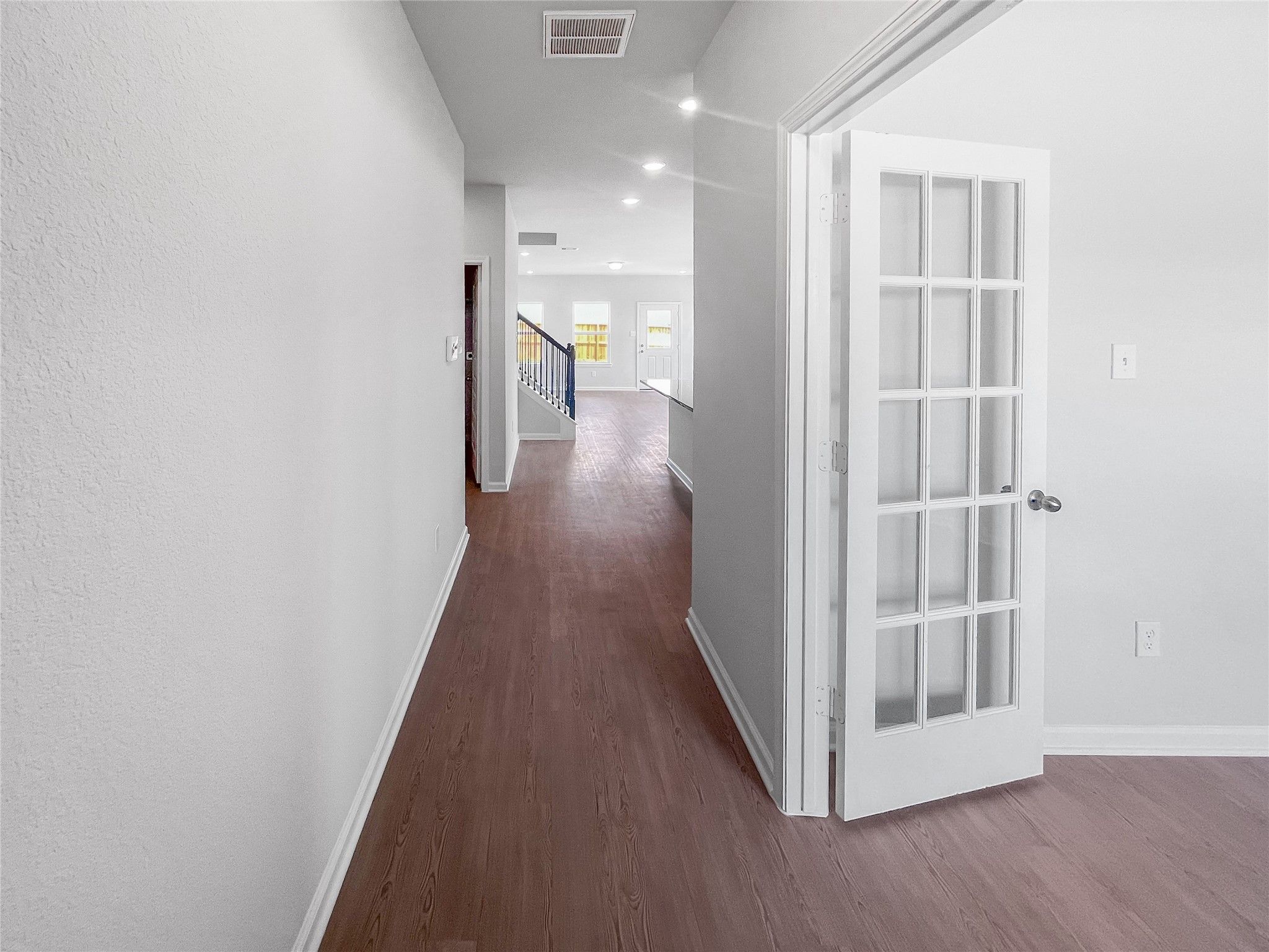 The Waring III- Foyer into Study with French doors. Sample image for illustration; upgrades, option