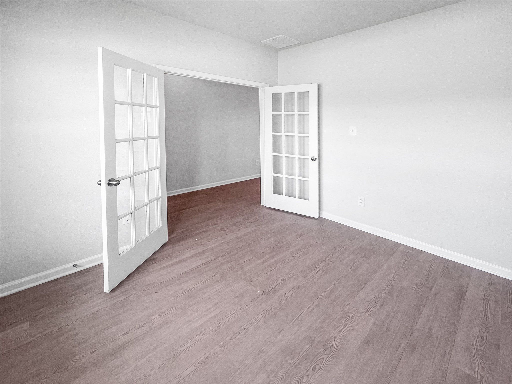 The Waring III- Study with French doors.l Sample image for illustration; upgrades, options, and col
