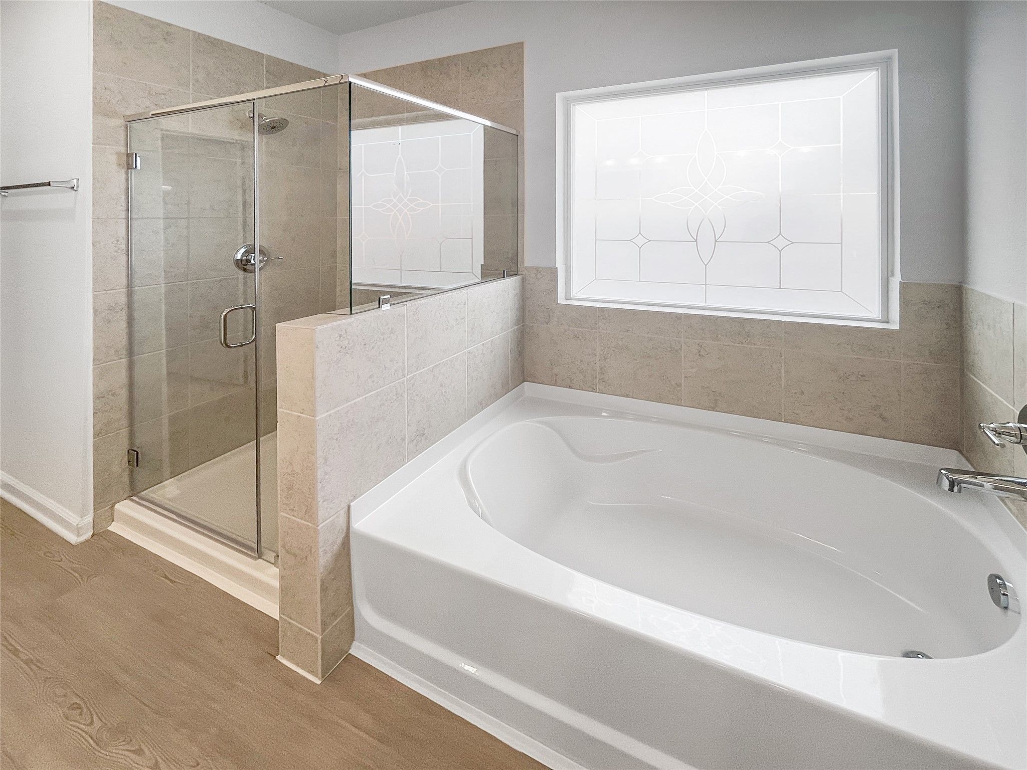 The Waring III- Primary Bathroom with Dual Vanities, Separate Garden tub and Walk-in Shower. Sample