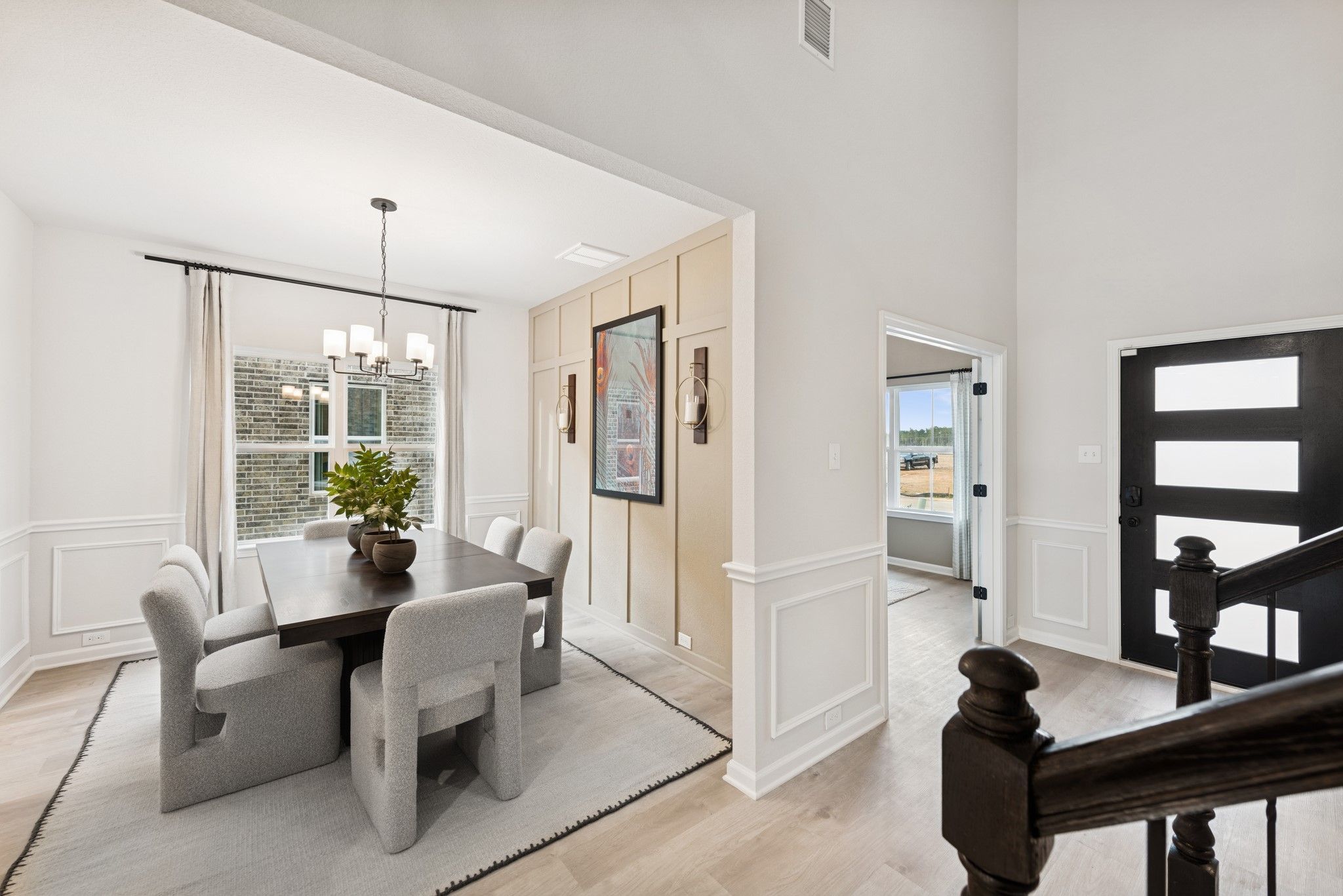 The Princeton II- Foyer, Study and Dining Room. Staged model home shown for illustration only; actu