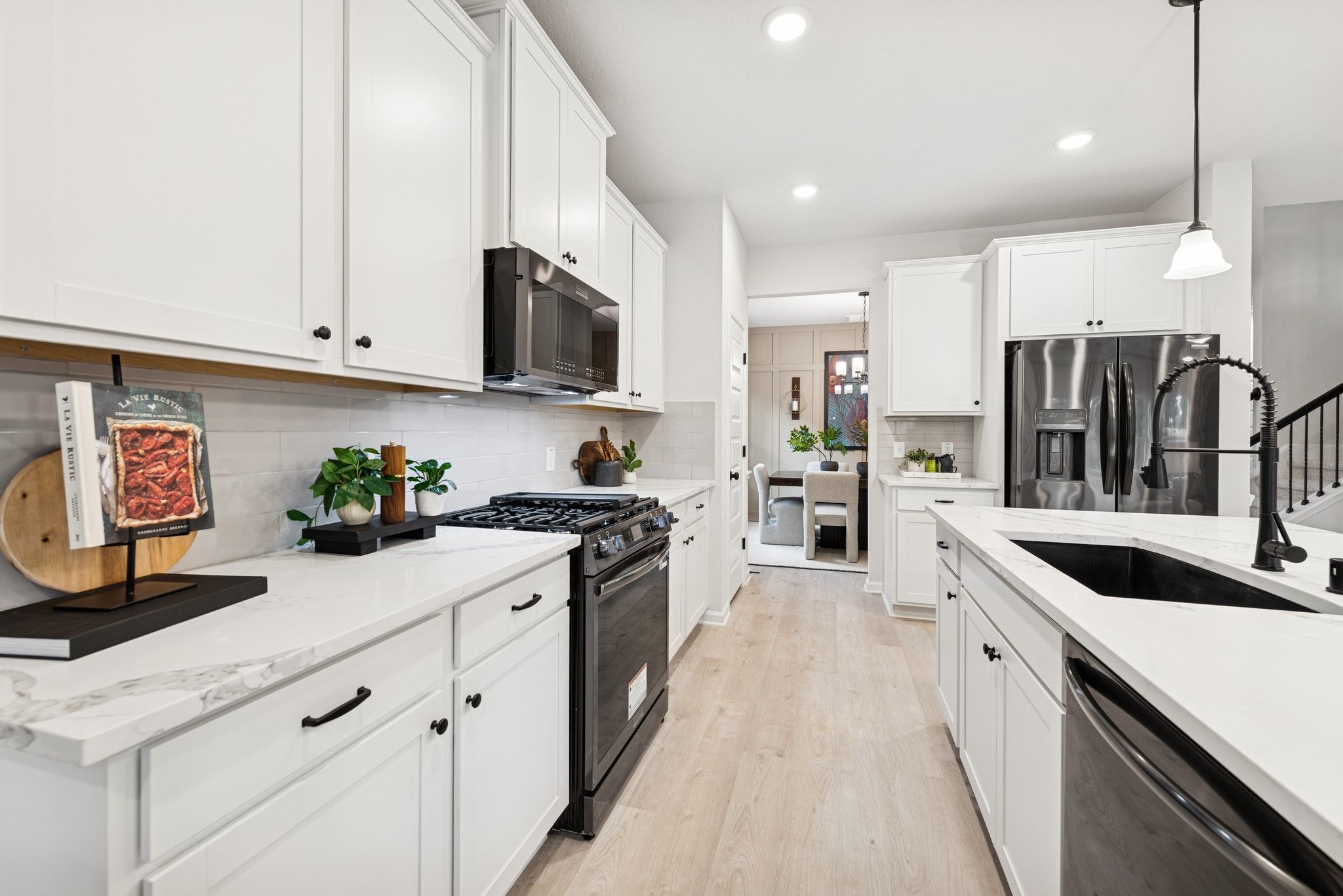 The Princeton II- Kitchen. Staged model home shown for illustration only; actual features, colors,