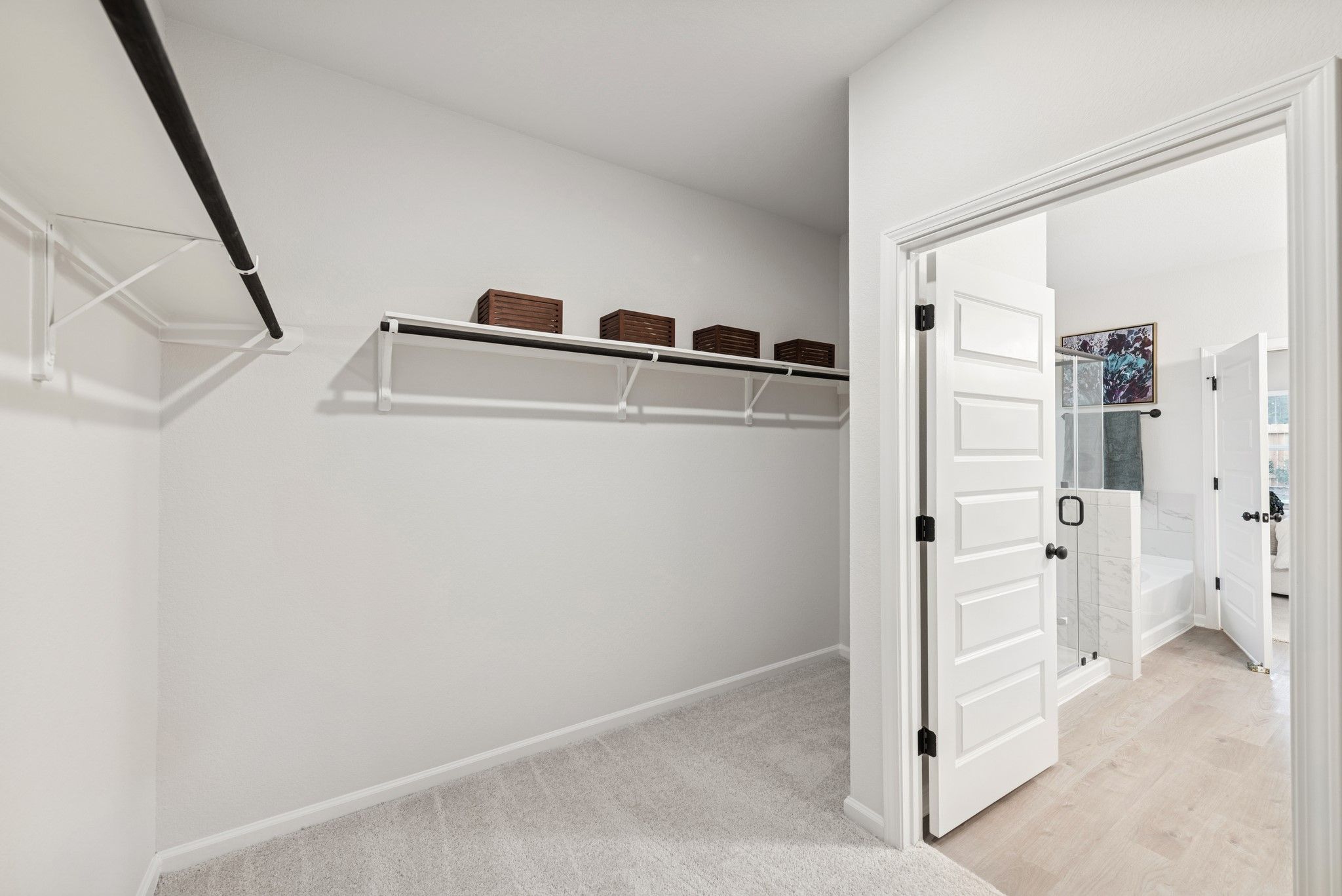 The Princeton II- Primary Bath Walk-In Closet. Staged model home shown for illustration only; actua