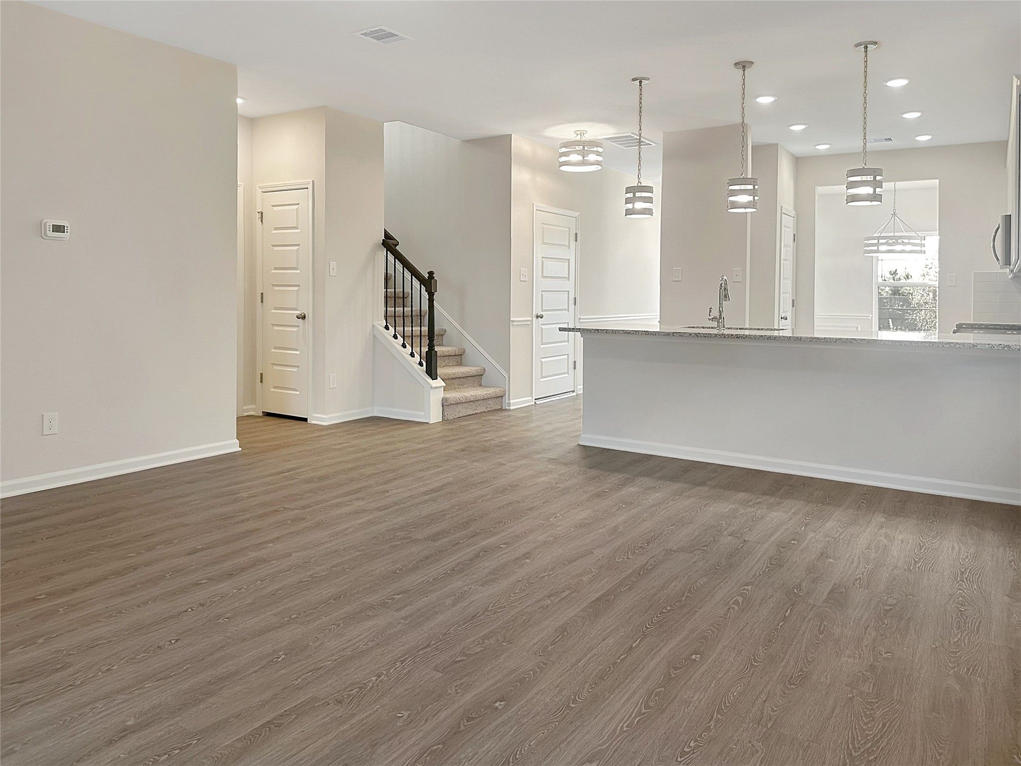 The Caldwell- Family Room. Home is under construction. Sample image for illustration; upgrades, opt