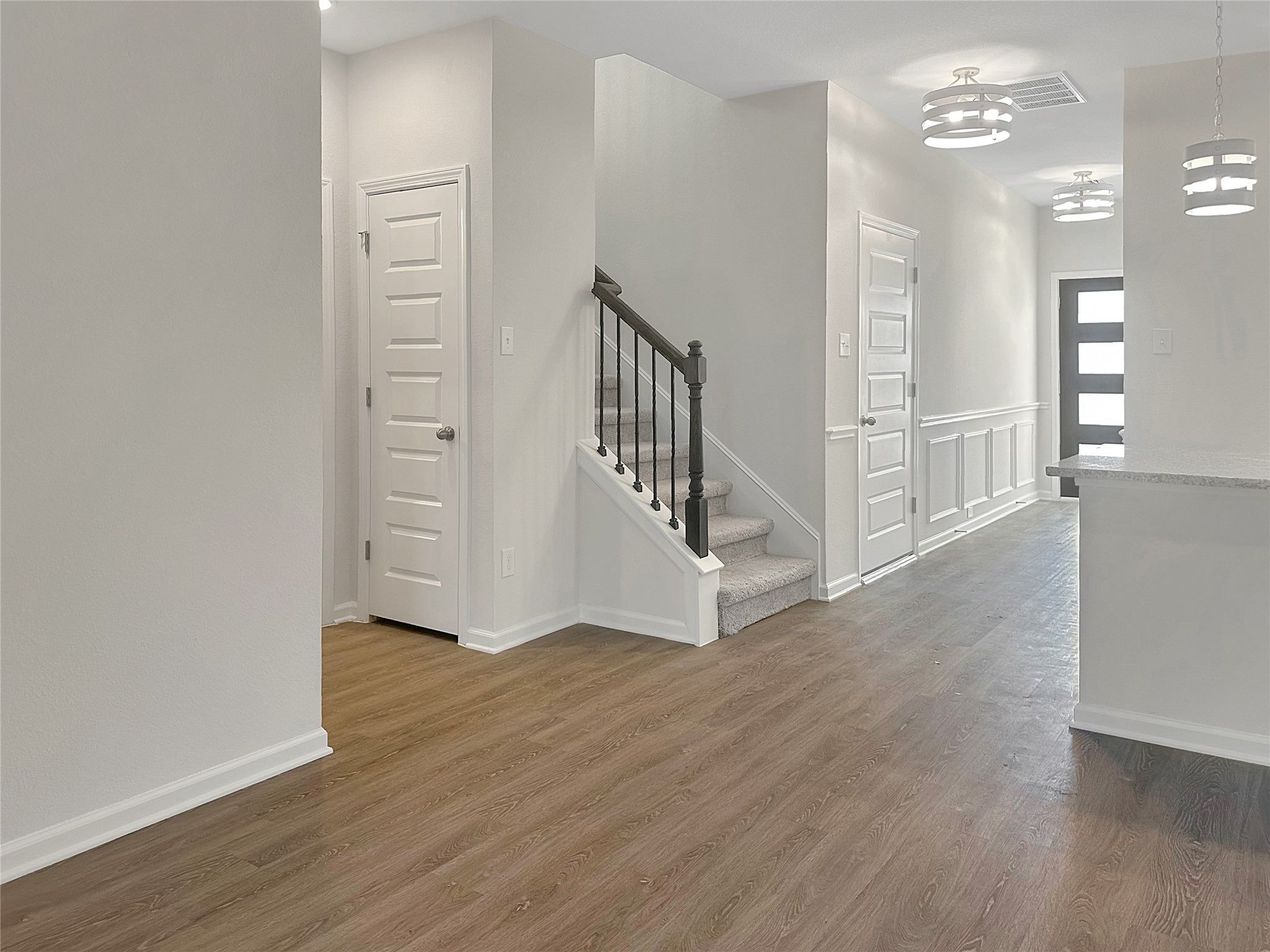 The Caldwell- Family Room and Foyer. Home is under construction. Sample image for illustration; upg