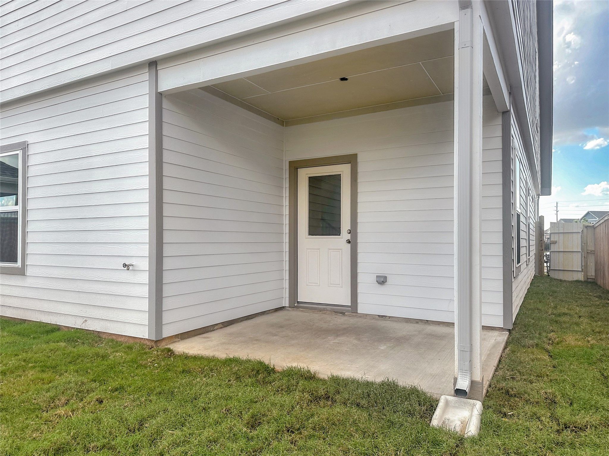 The Caldwell- Rear Covered Patio. Home is under construction. Sample image for illustration; upgrad