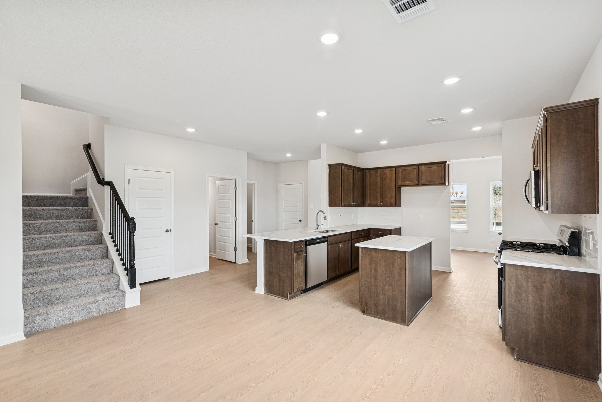 The Georgetown II- Breakfast Area into Kitchen. Home under construction, photo used for illustrativ