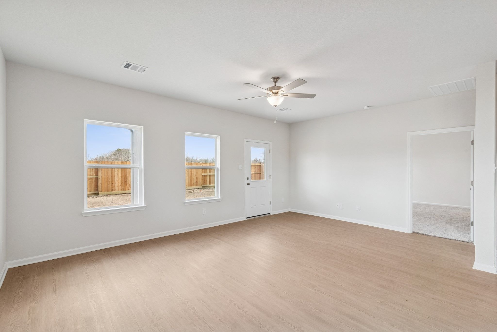 The Georgetown II- Family Room. Home under construction, photo used for illustrative purposes only,