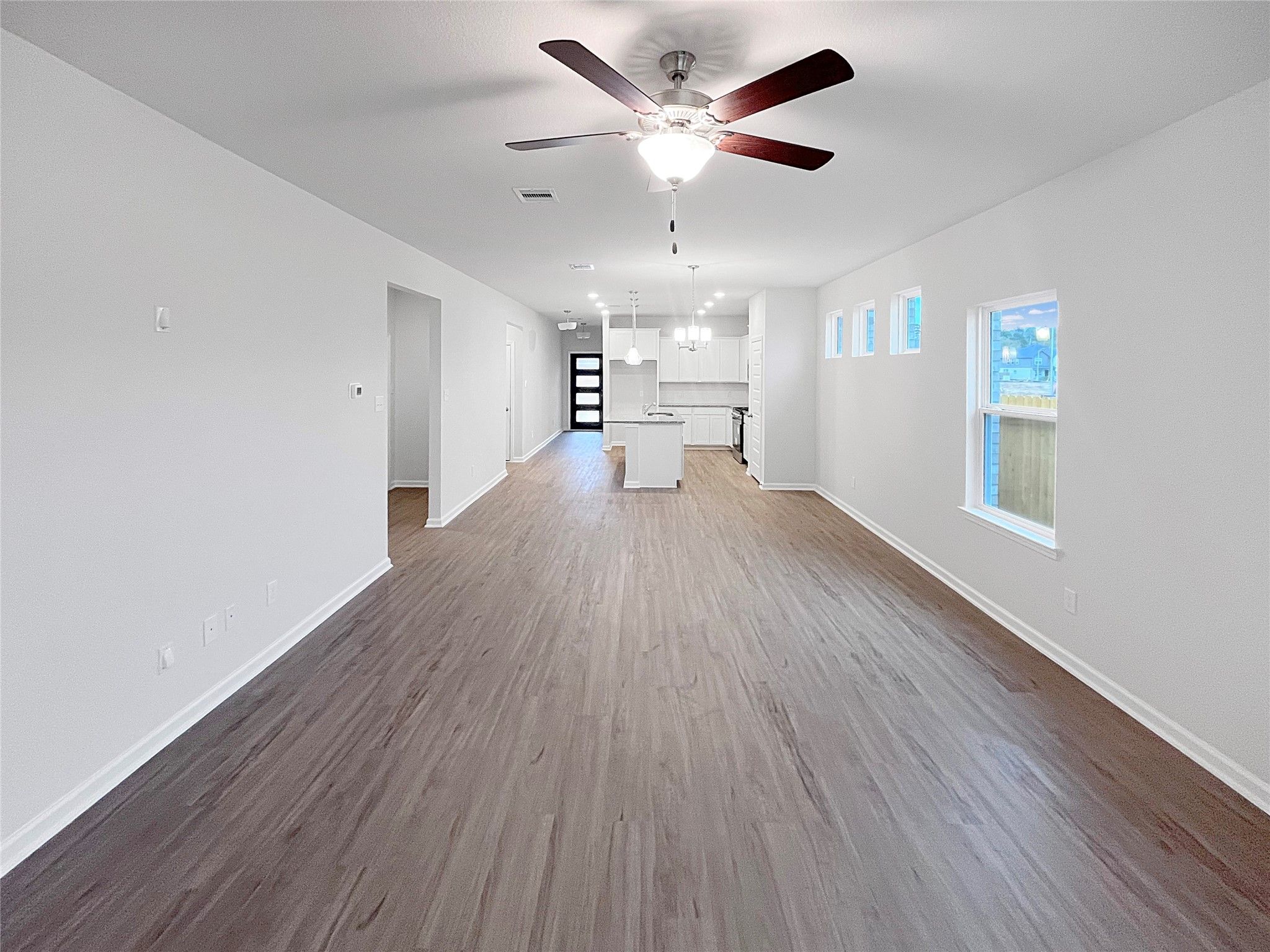 Family Room. Sample image for illustration; upgrades, options, and colors may vary.