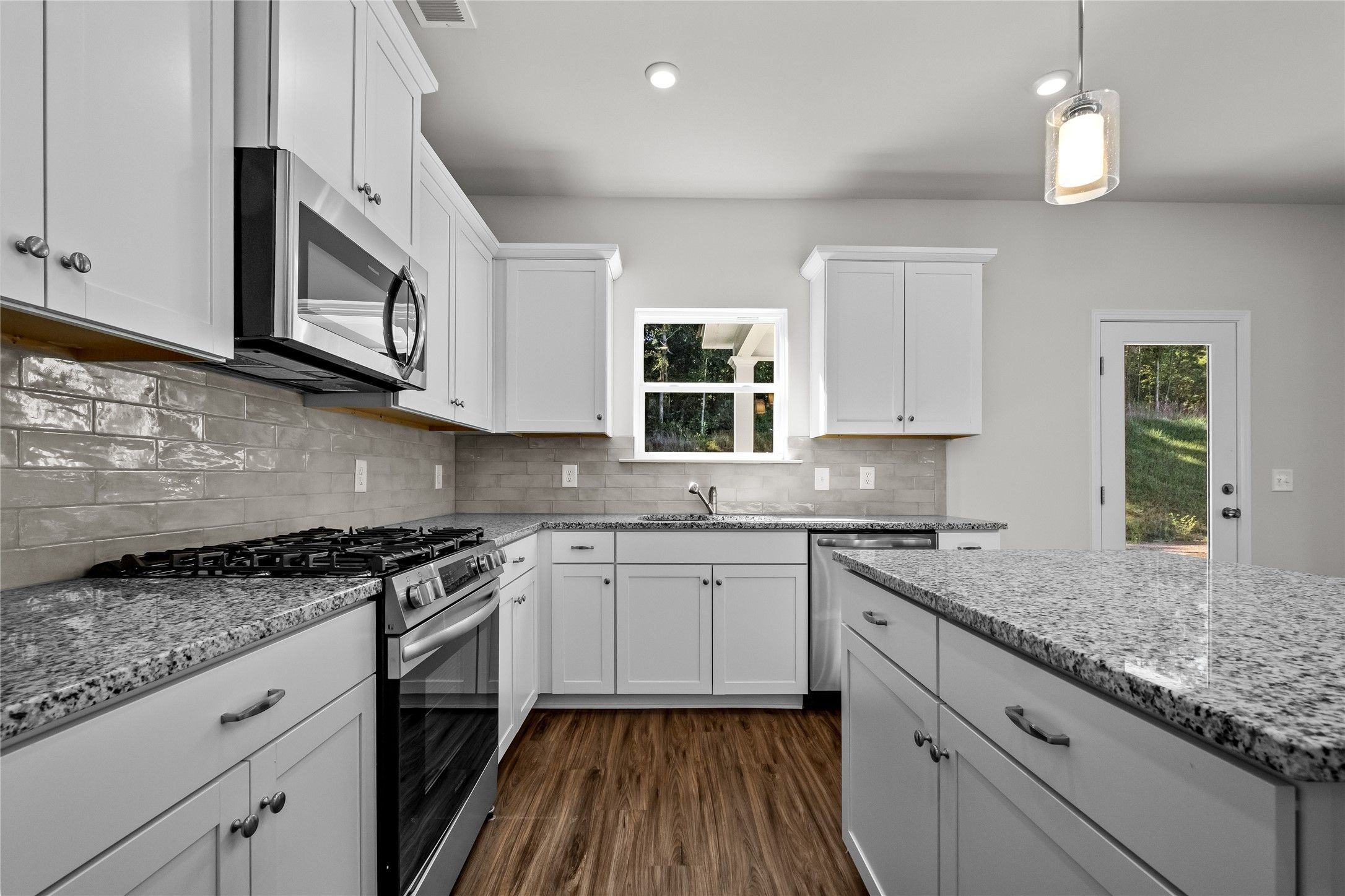 The Coleman- Kitchen. Home under construction, photo used for illustrative purposes only, colors an