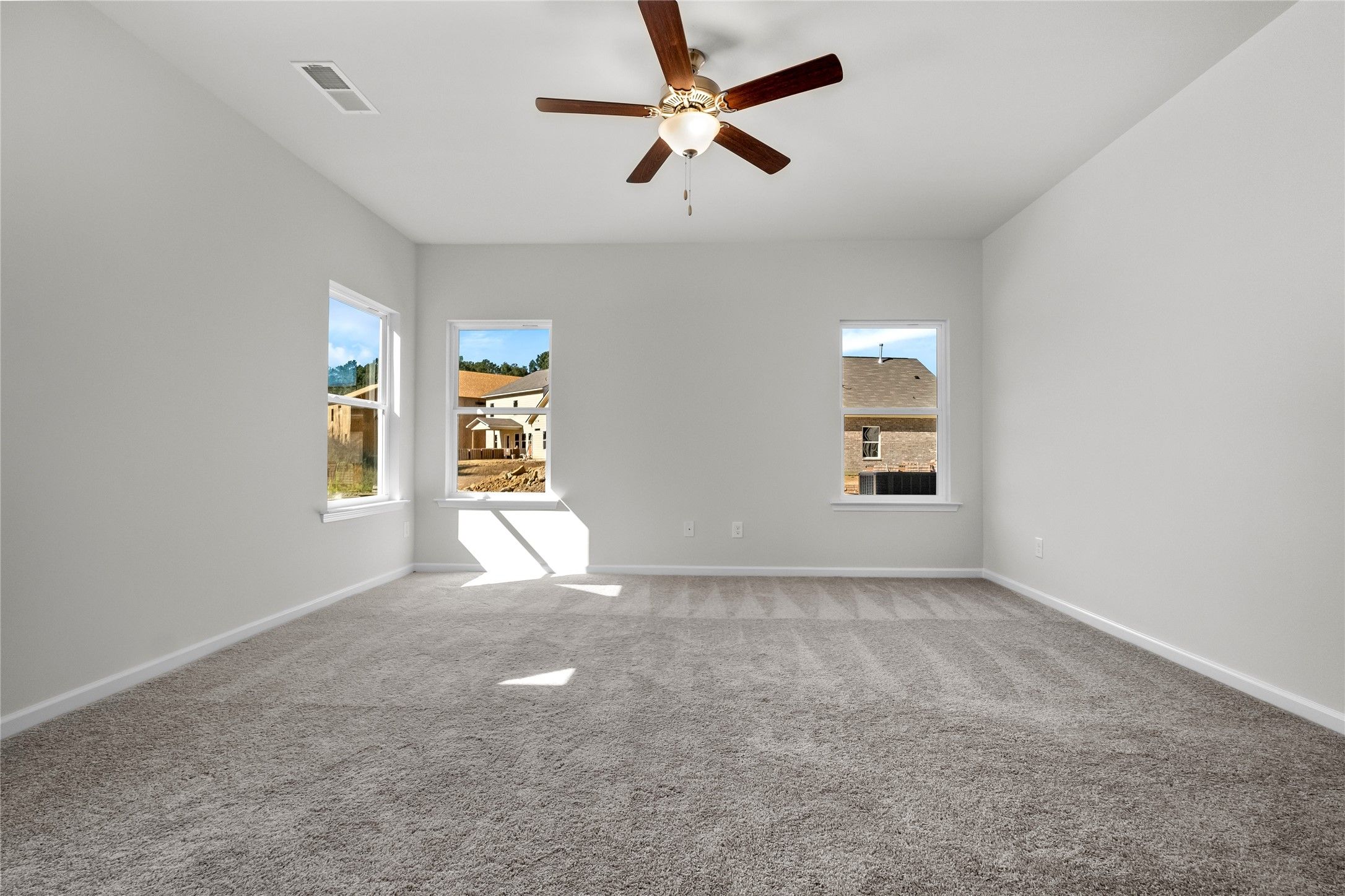 The Coleman- Family Room. Home under construction, photo used for illustrative purposes only, color