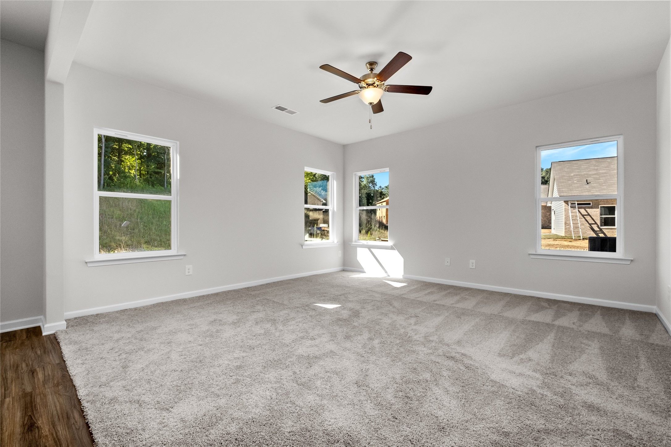 The Coleman- Family Room. Home under construction, photo used for illustrative purposes only, color