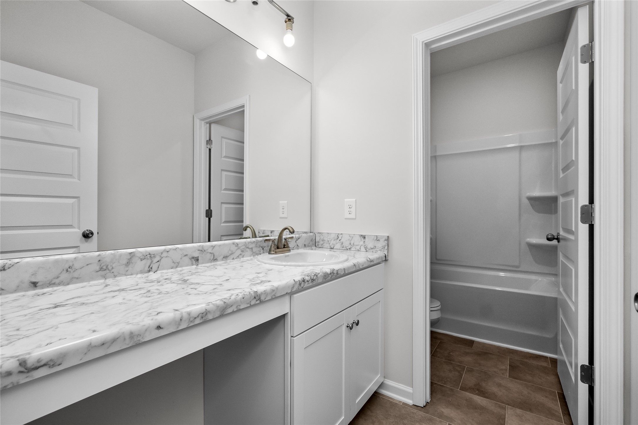 The Coleman- Hall Bath. Home under construction, photo used for illustrative purposes only, colors