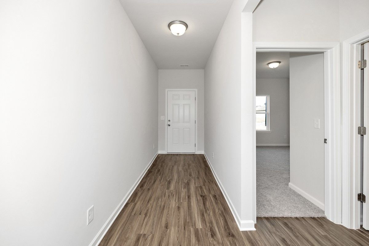 The Avery- Extended Foyer. Sample image for illustration; upgrades, options, and colors may vary.