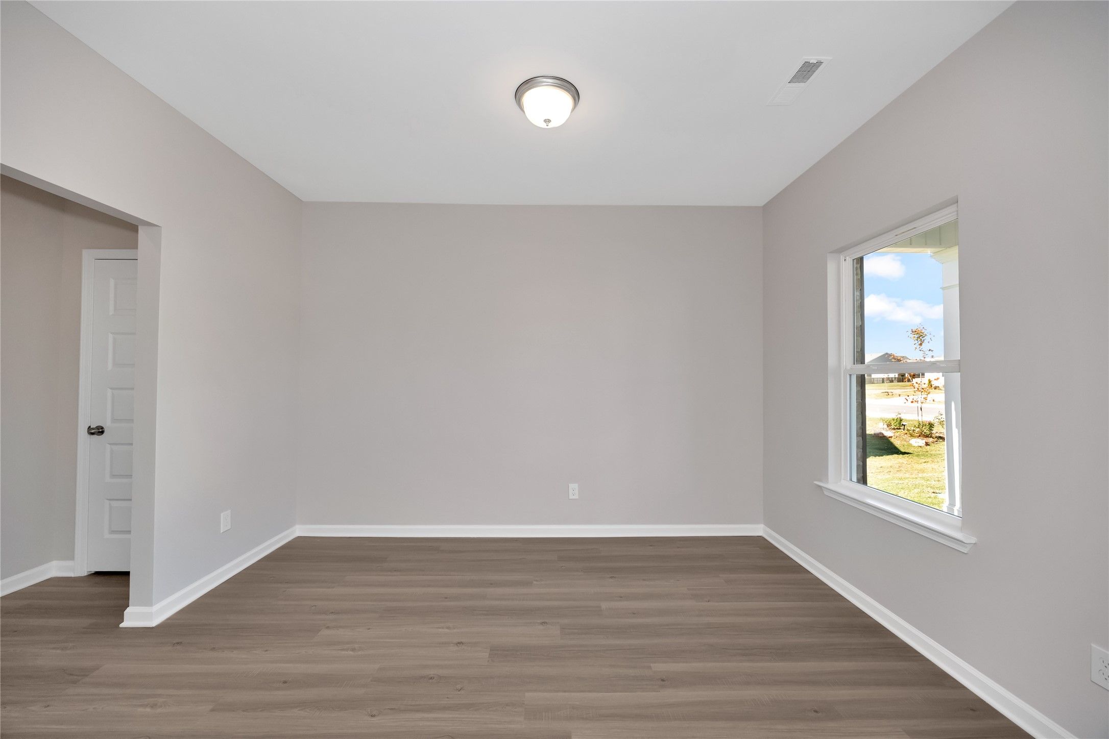 The Harrington- Foyer into Study (French doors not pictured). Sample image for illustration; upgrad