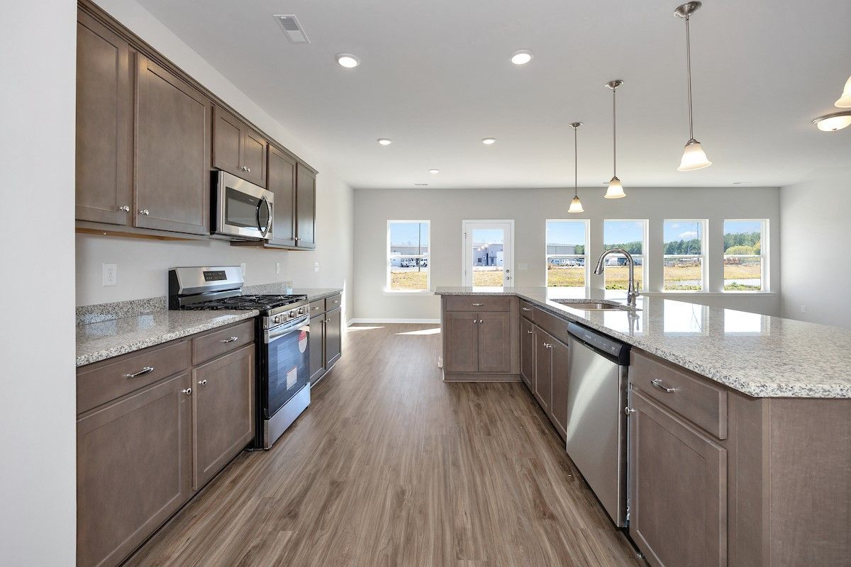 The Avery- Kitchen. Sample image for illustration; upgrades, options, and colors may vary.