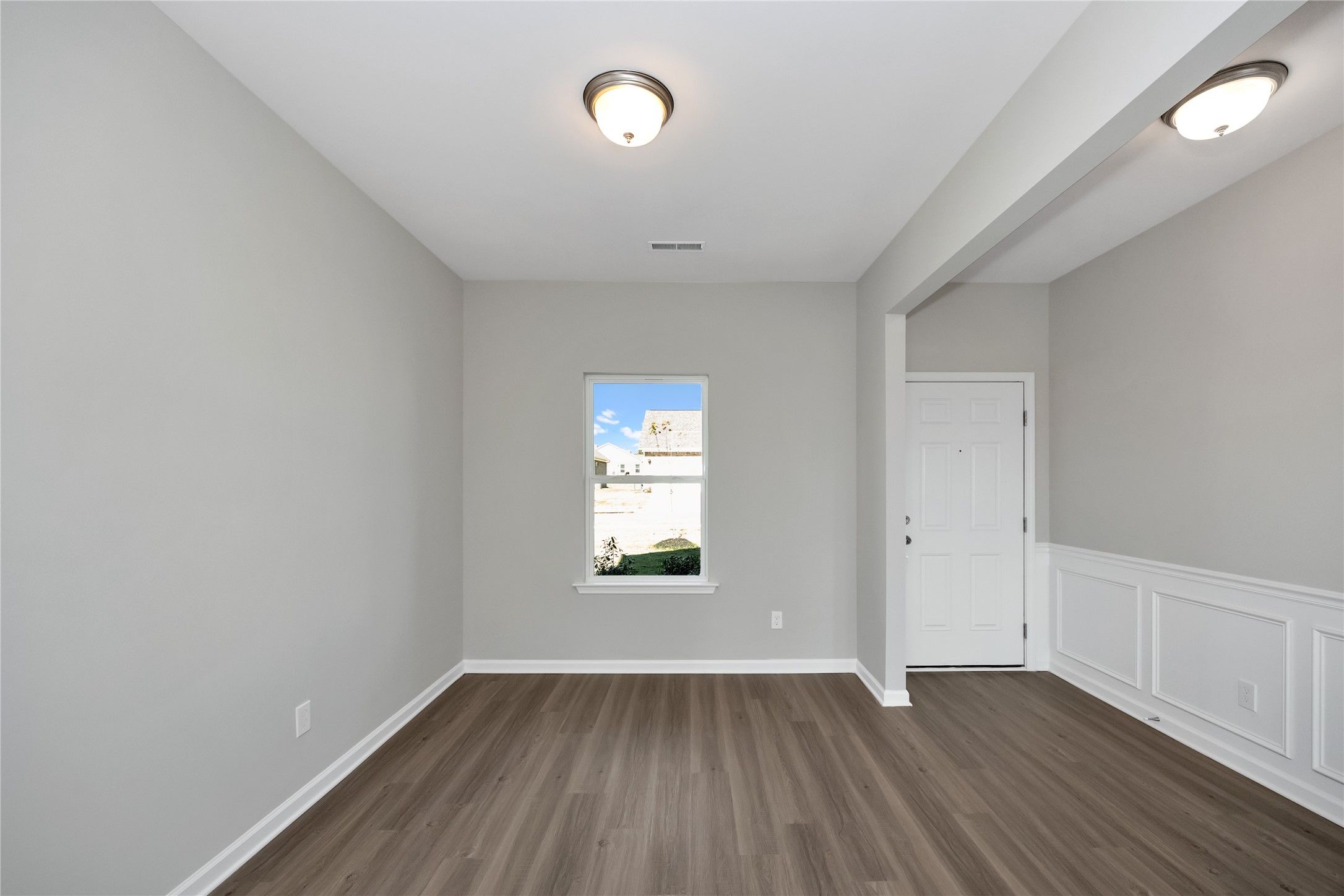 The Harrington- Foyer into Study (French doors not pictured). Sample image for illustration; upgrad