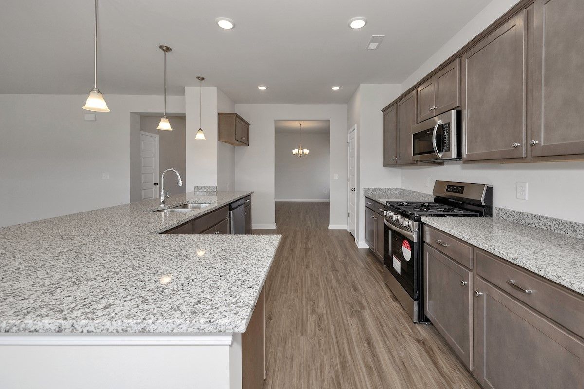 The Avery- Kitchen. Sample image for illustration; upgrades, options, and colors may vary.