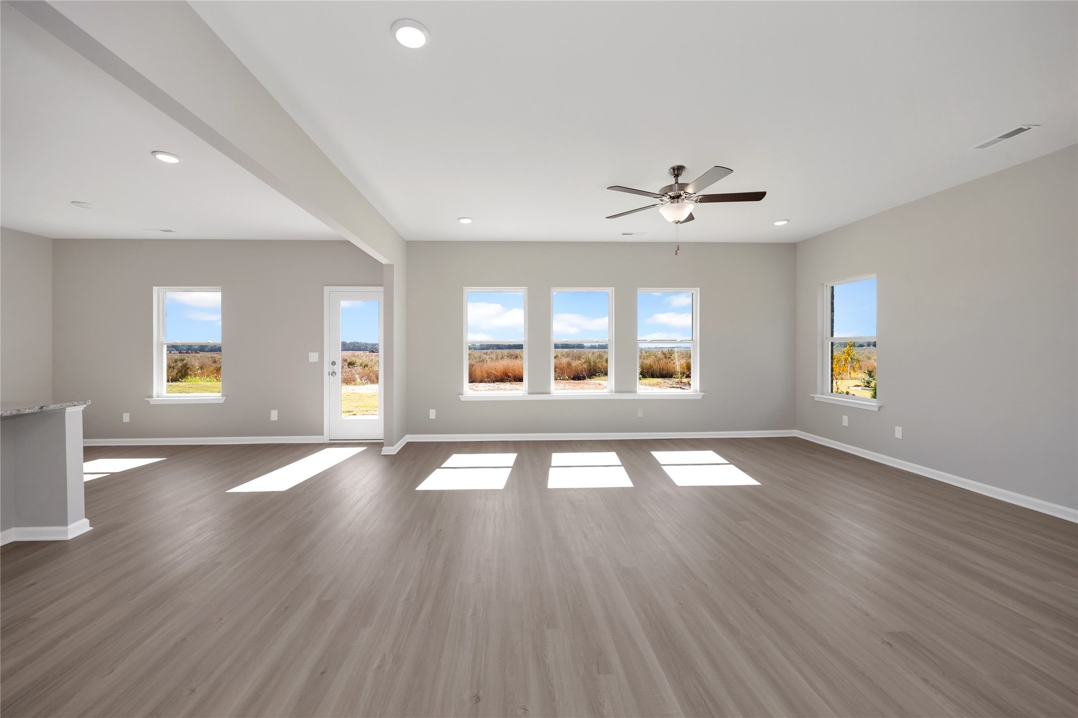 The Harrington- Family Room. Sample image for illustration; upgrades, options, and colors may vary.