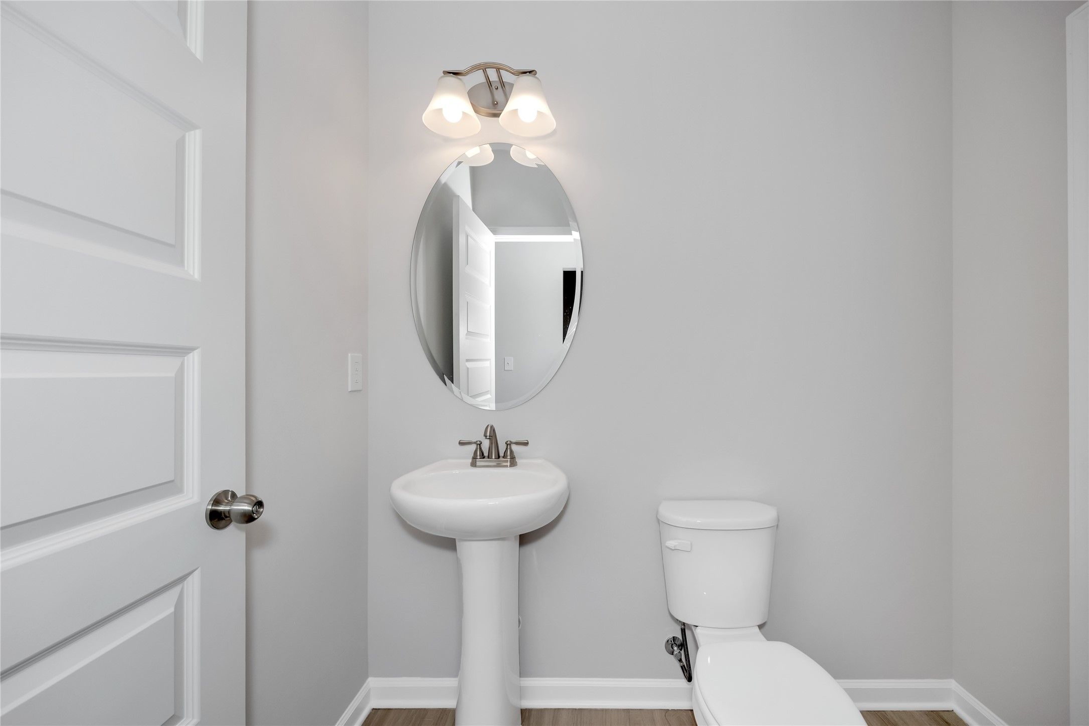 The Harrington- First floor powder bath. Sample image for illustration; upgrades, options, and colo